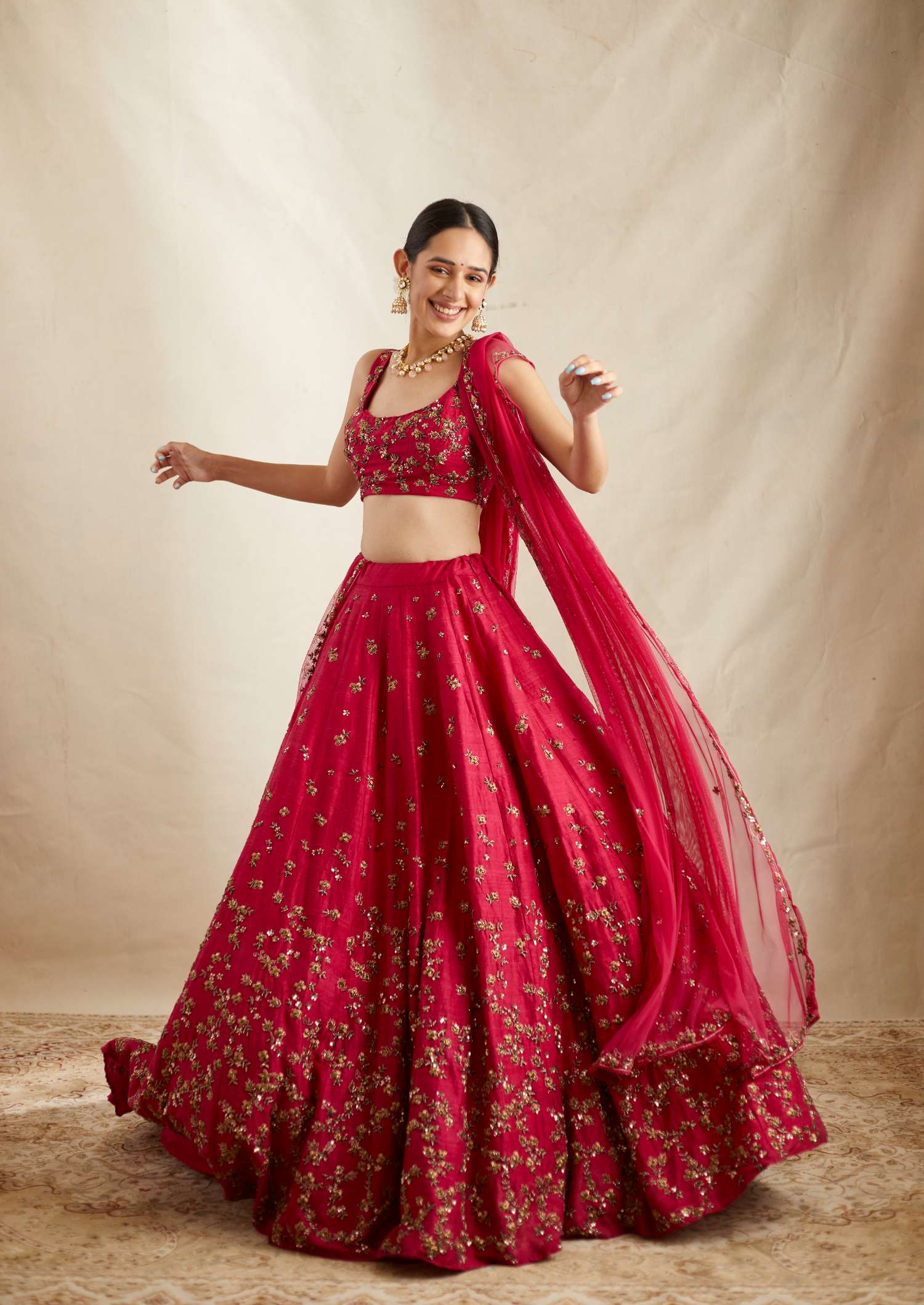 Side Front view of Caramine Pink Embellished Lehenga Set