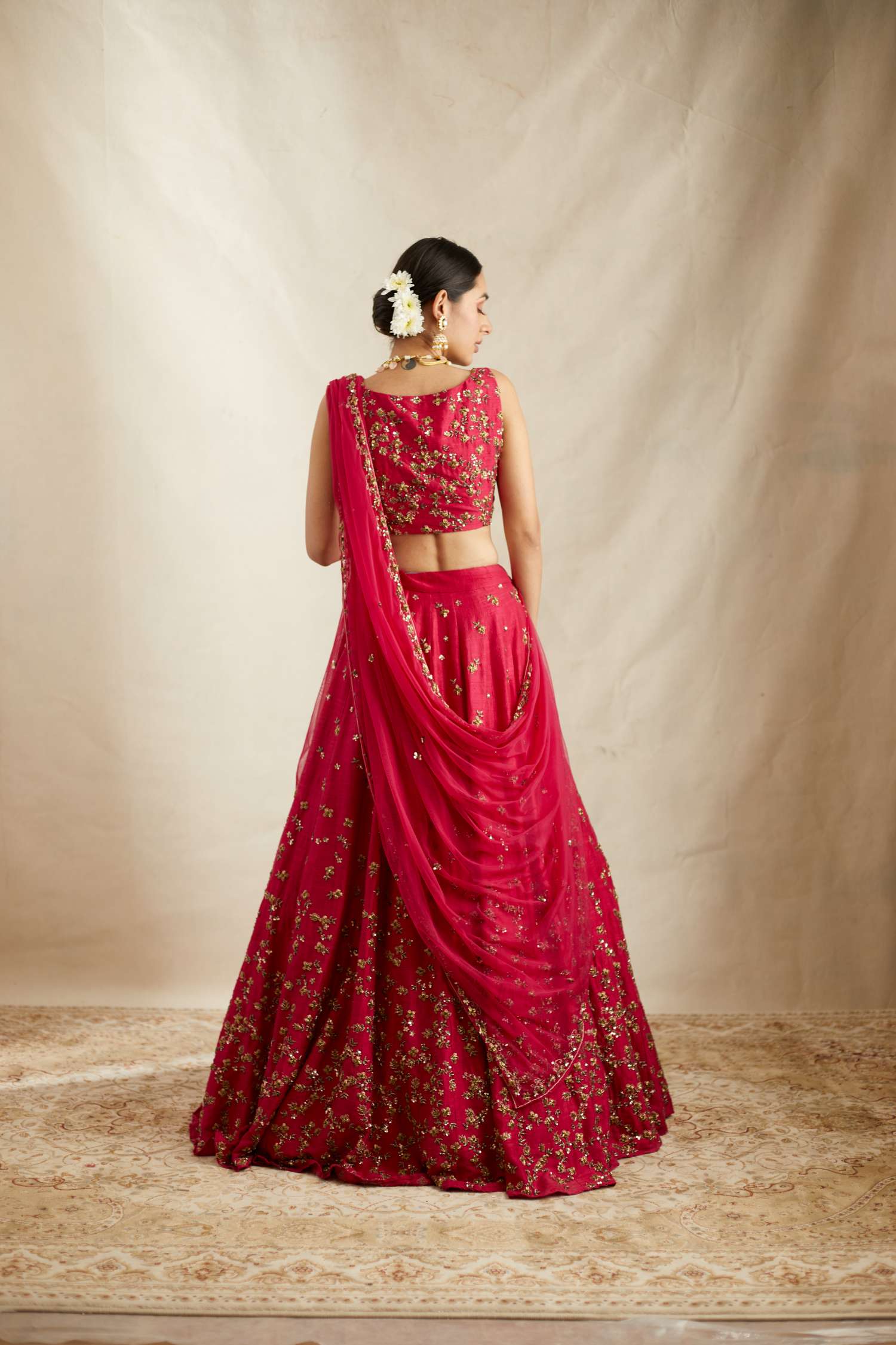 Back Angle view of Caramine Pink Embellished Lehenga Set