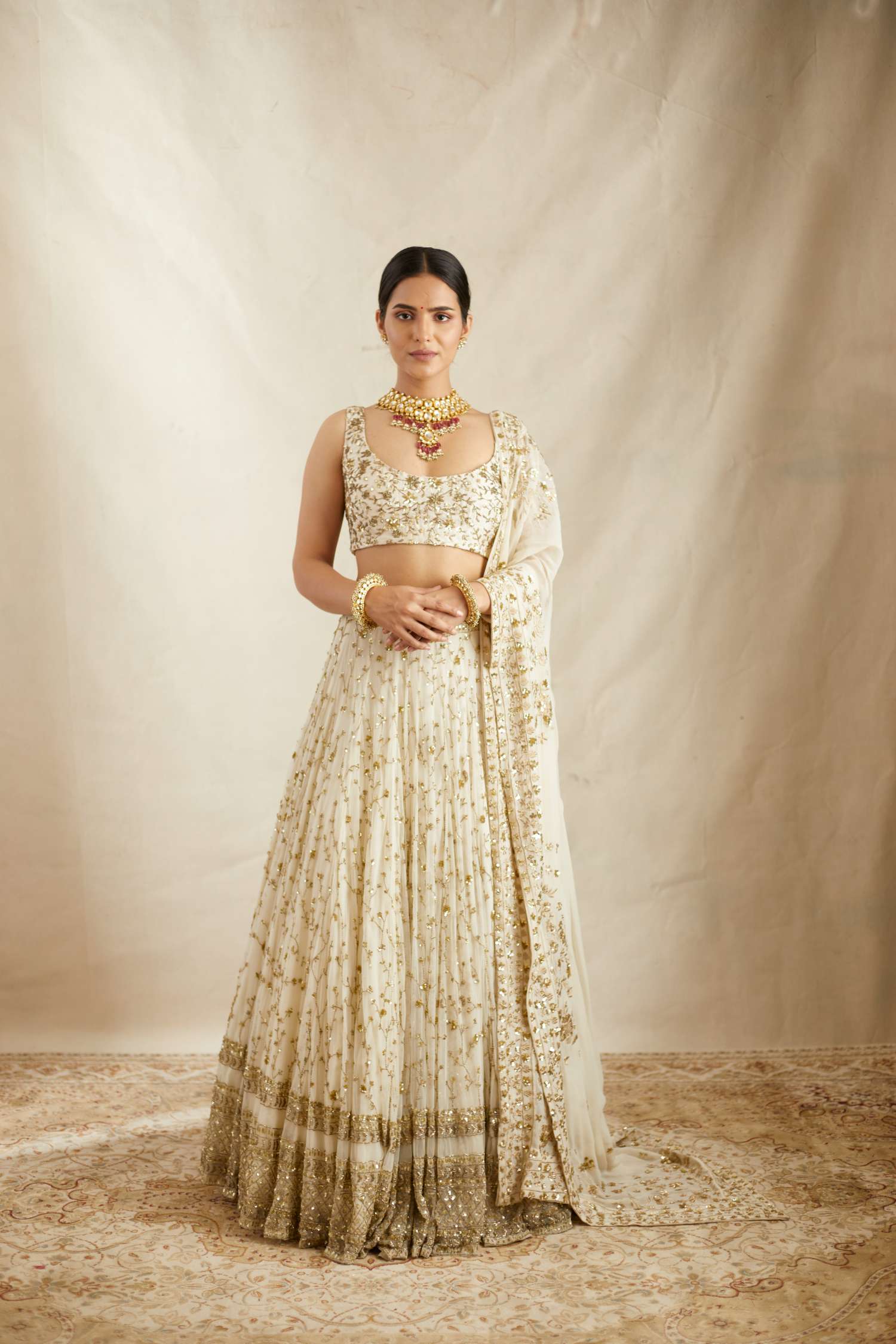 Front view of Off White Heavy Jaal Work Lehenga Set