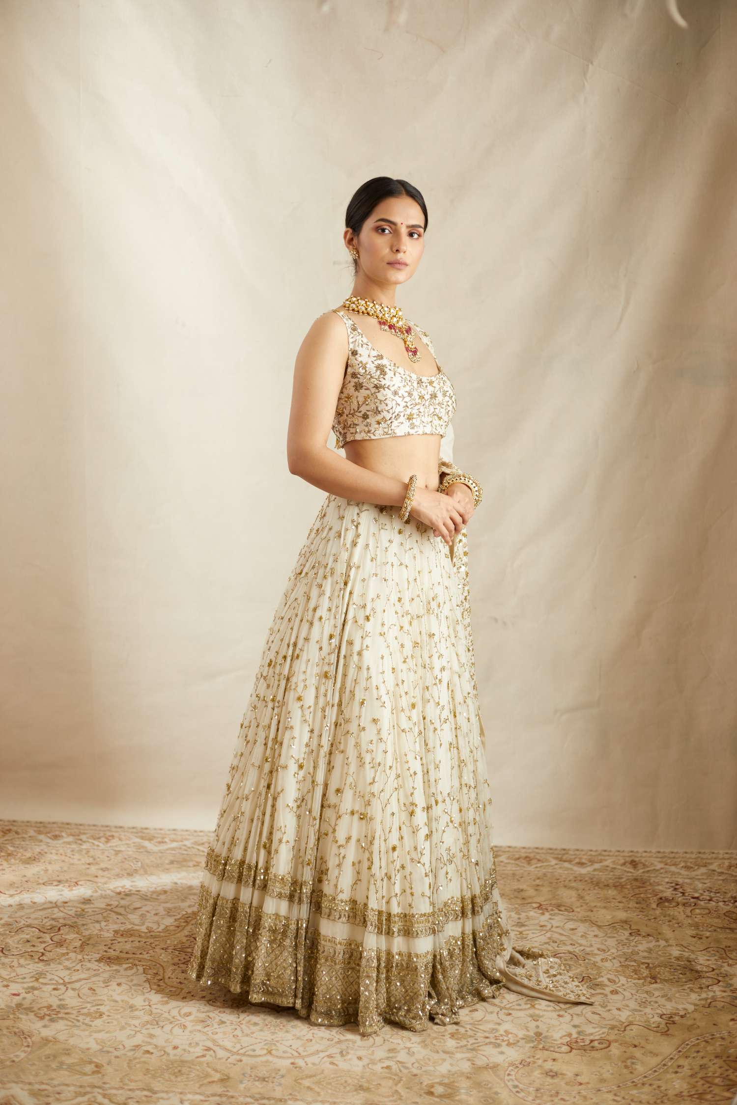 Front Side view of Off White Heavy Jaal Work Lehenga Set