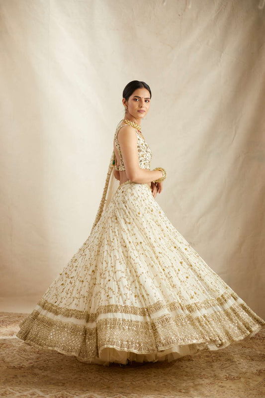 Off White Heavy Jaal Work Lehenga Set