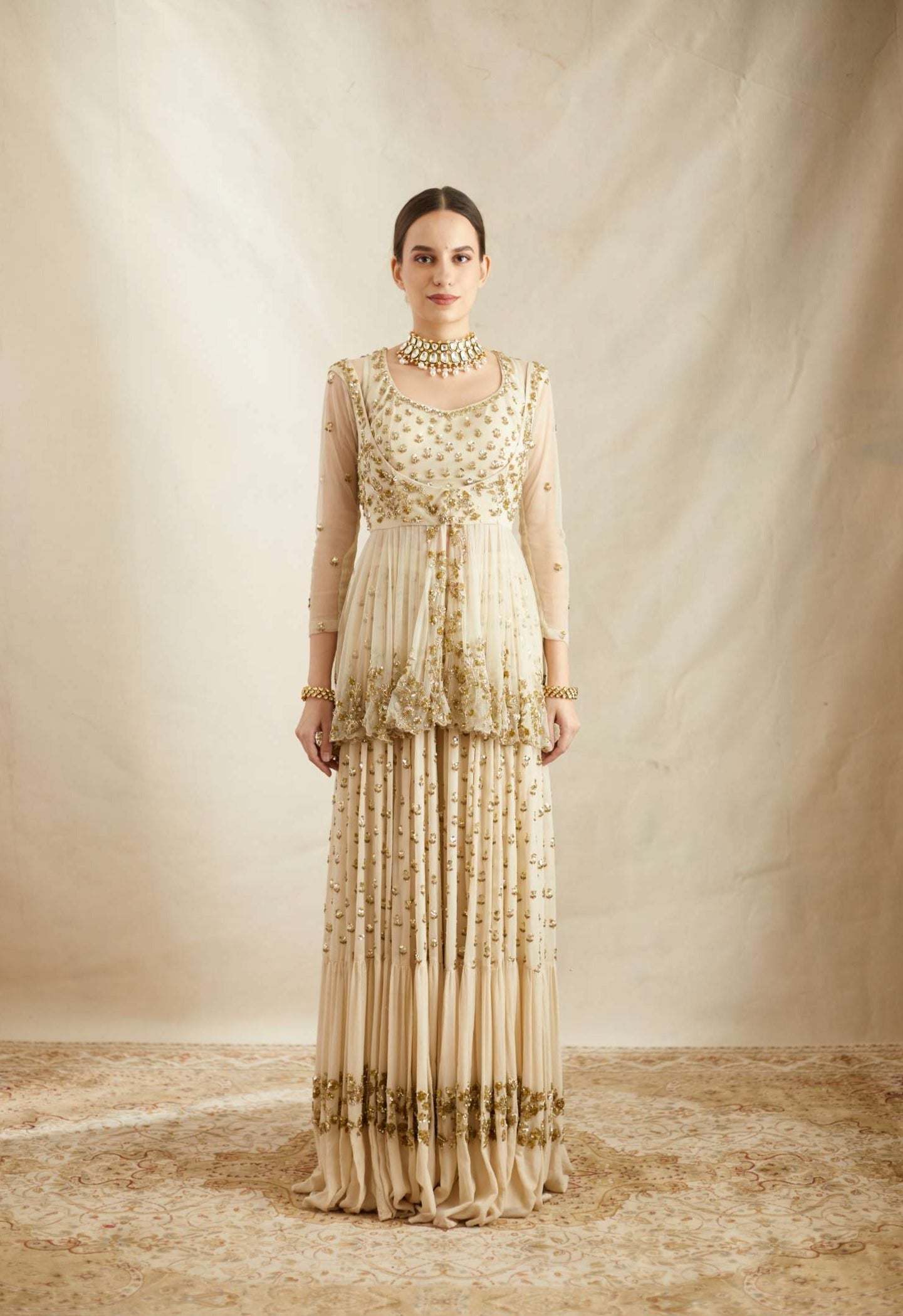 Front view of Off White Boot Peplum Georjette Sharara Set for Women