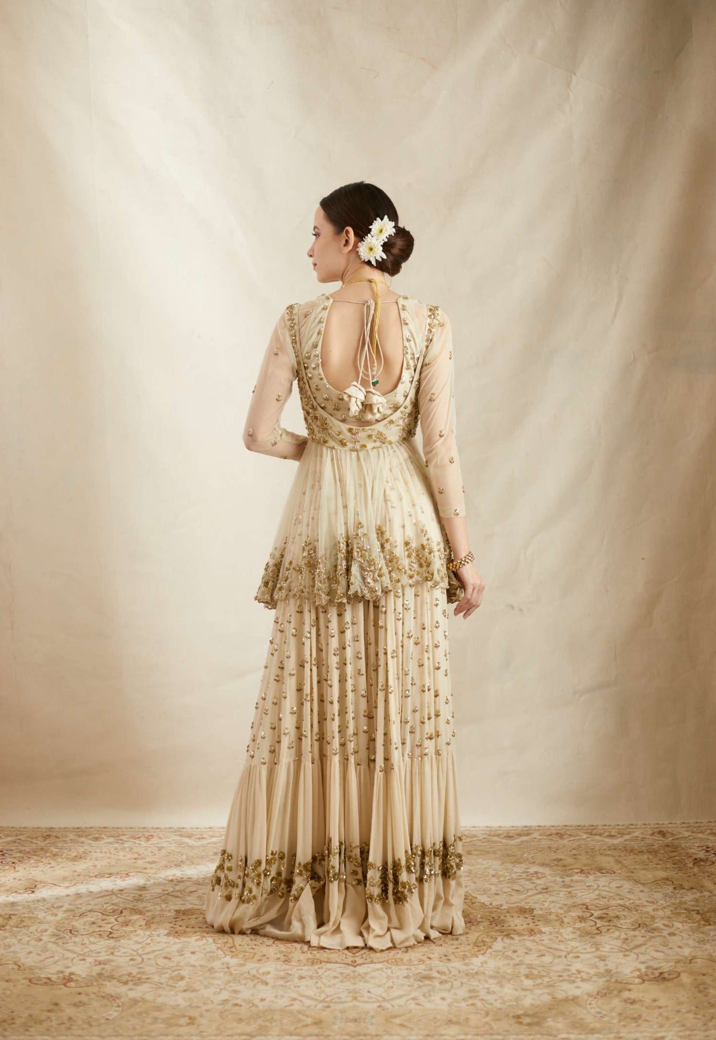 Back Angle view of Off White Boot Peplum Georjette Sharara Set