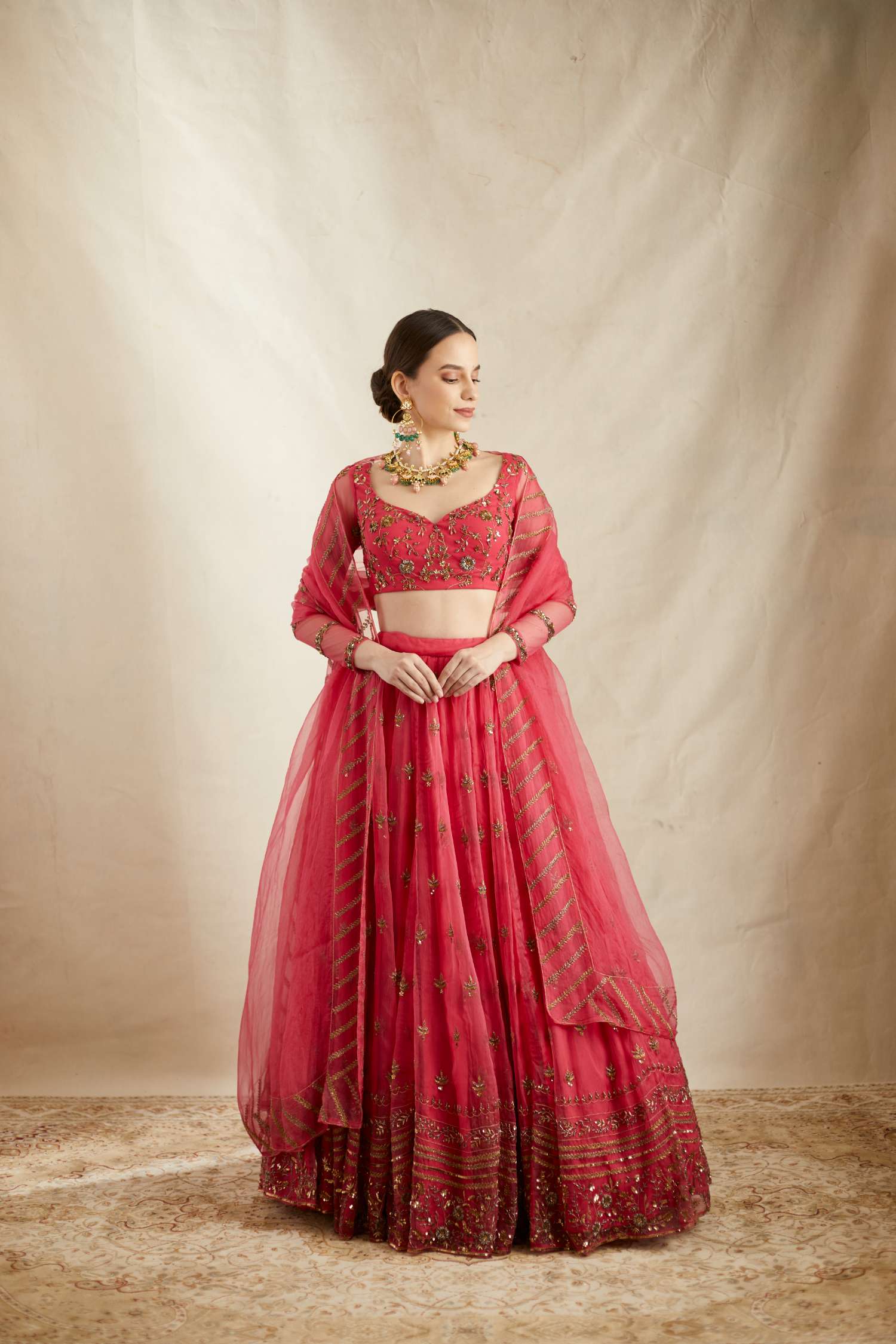 Side view of Carmine Pink Silk Organza Crepe Embroidered Lehenga