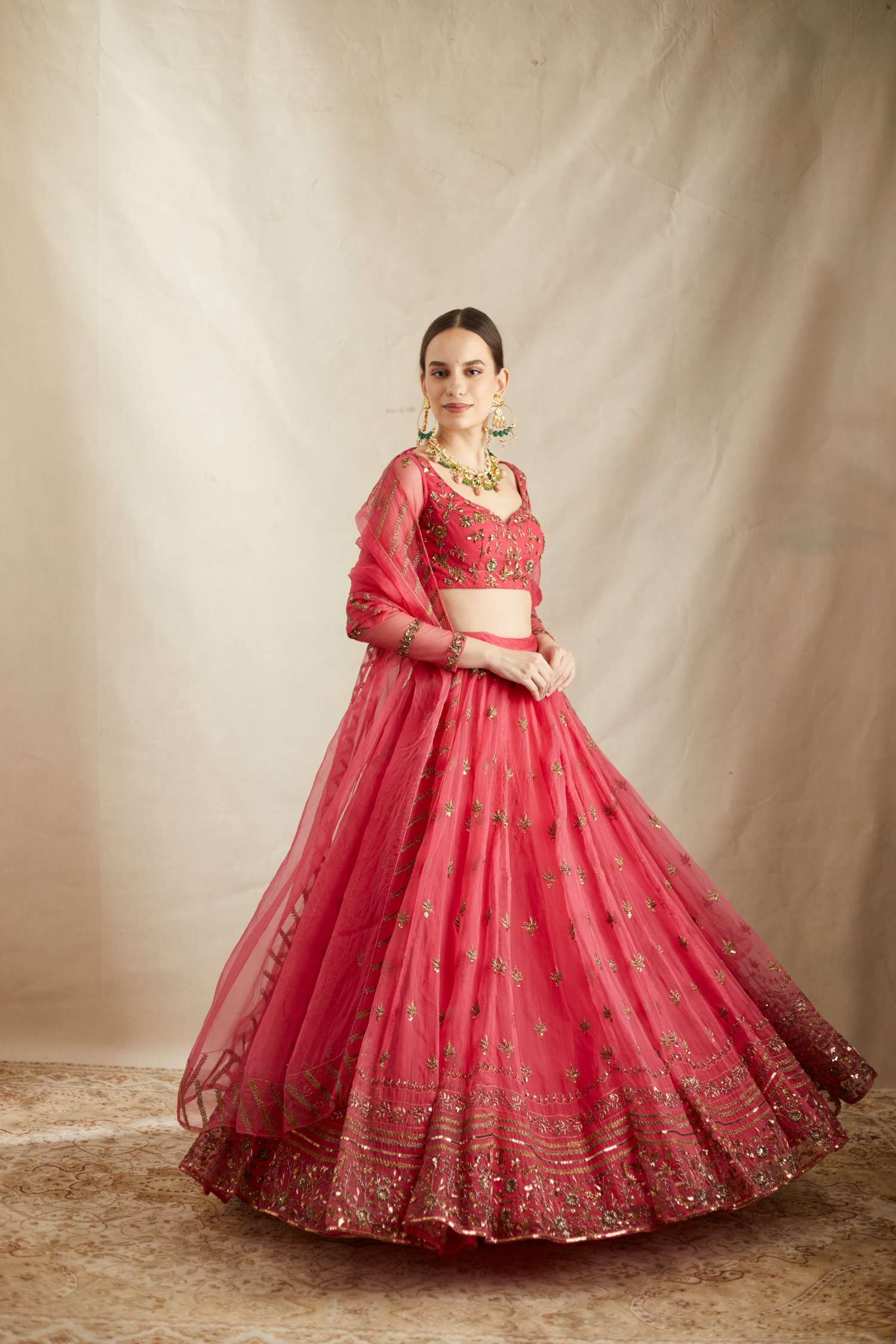 Side Ftont view of Carmine Pink Silk Organza Crepe Embroidered Lehenga