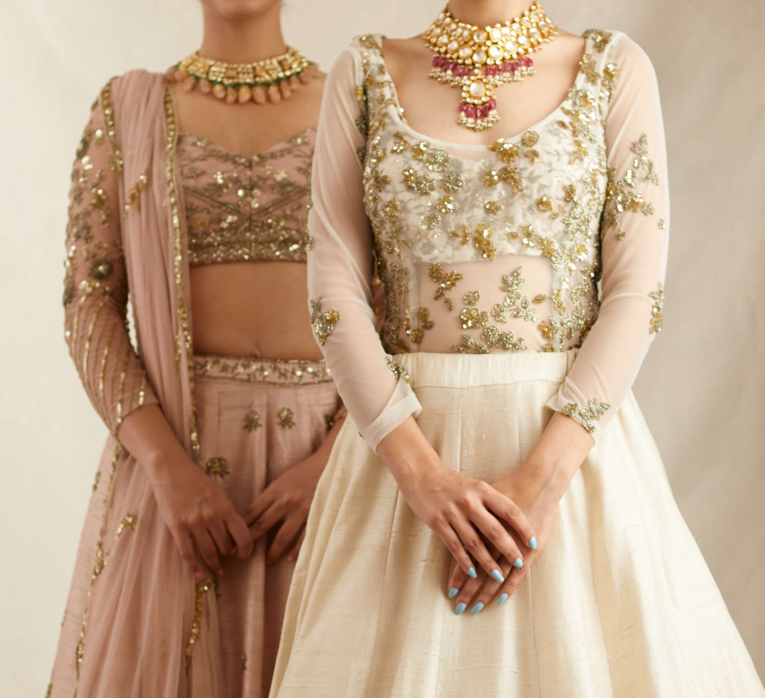 Close-up View of Peach Pink Embroidered Raw Silk Lehenga Set