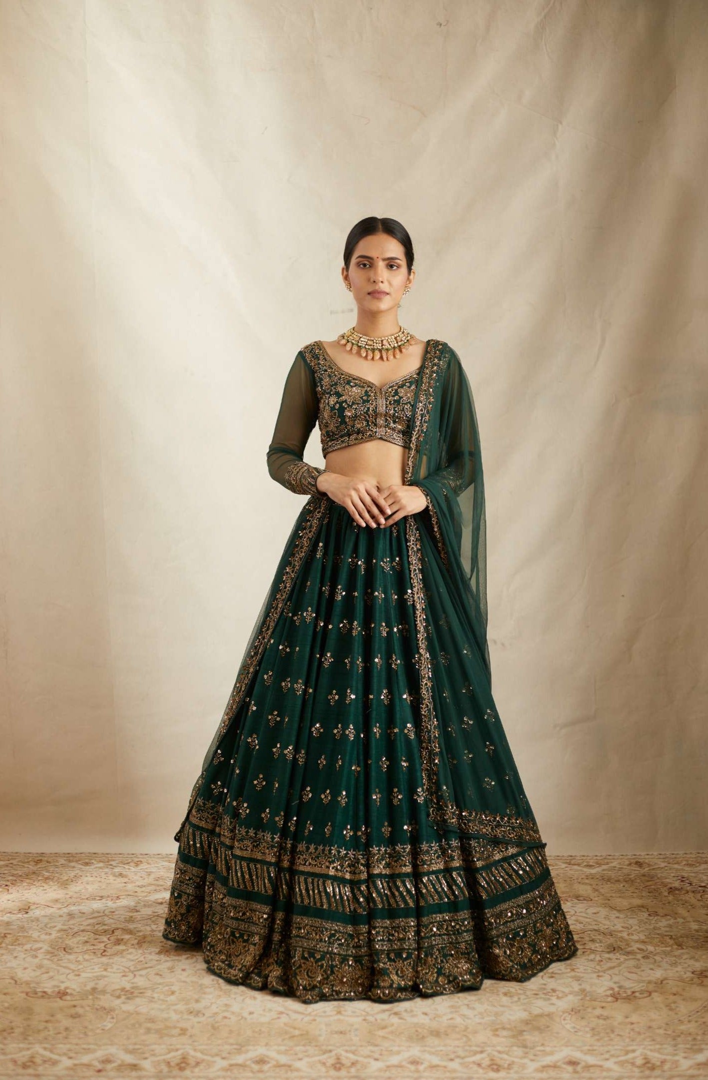 Front Angle view of Embrelled Green Raw Silk Lehenga Set