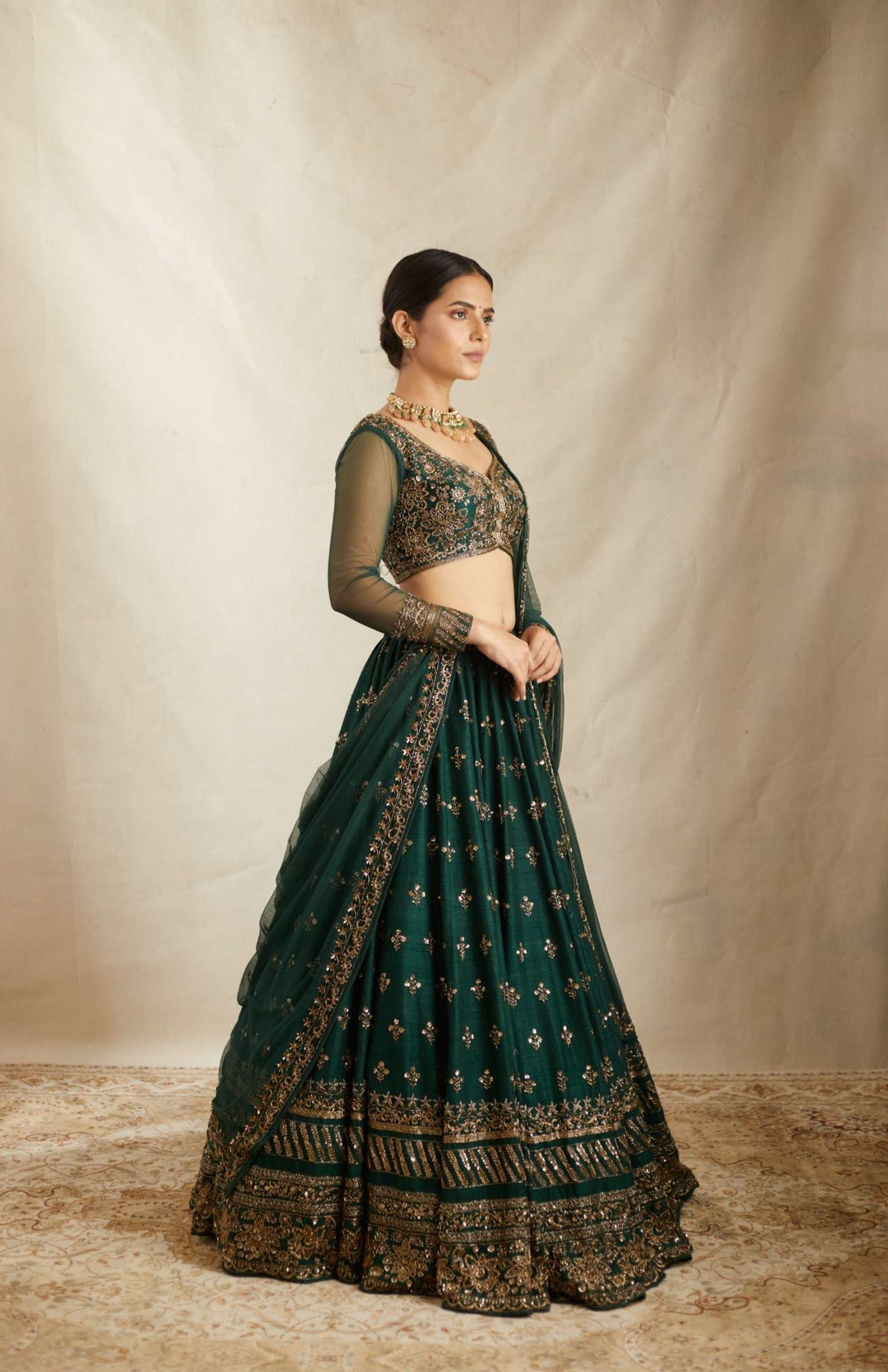 Front Side view of Embrelled Green Raw Silk Lehenga Set