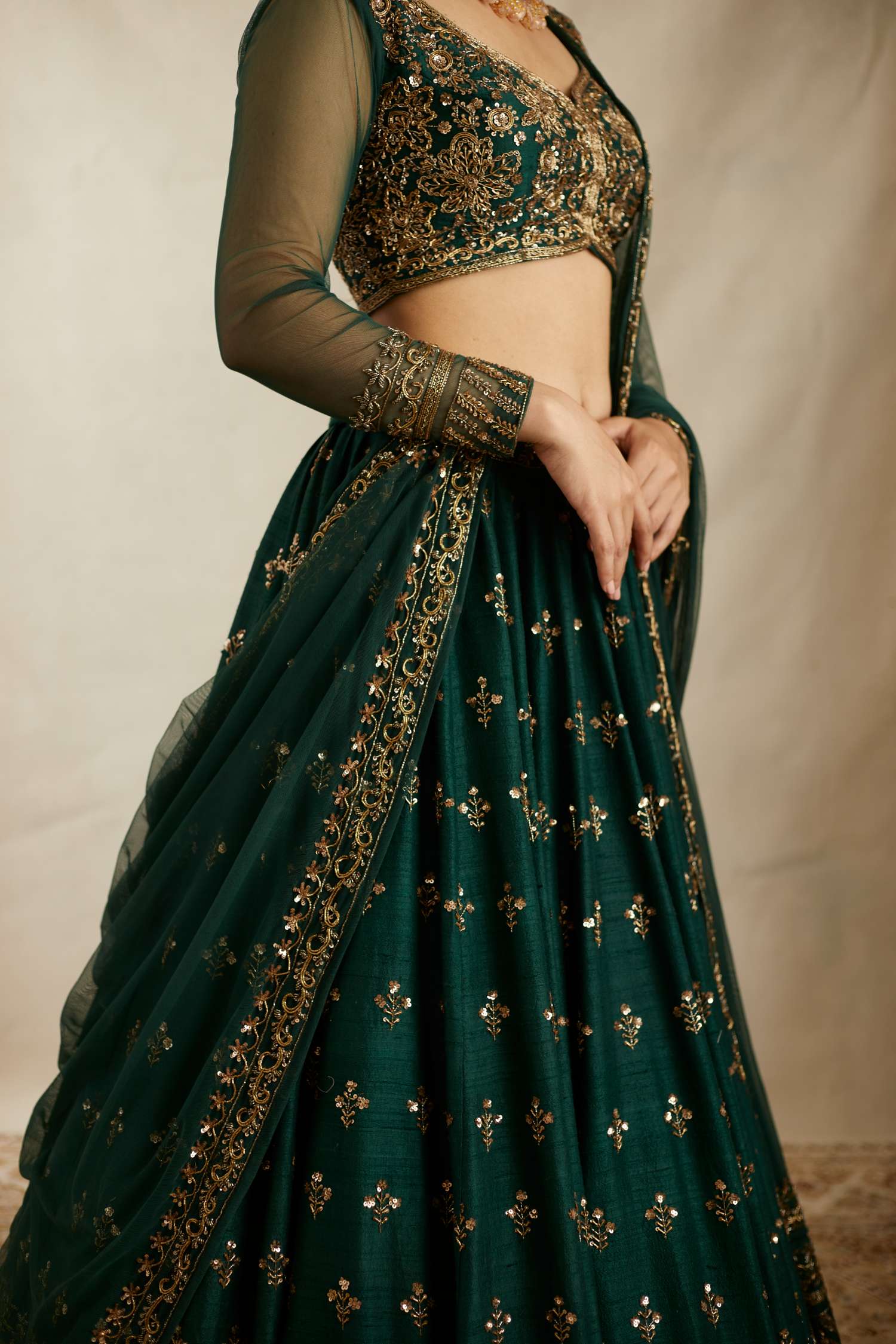 Close-up View of Embrelled Green Raw Silk Lehenga Set