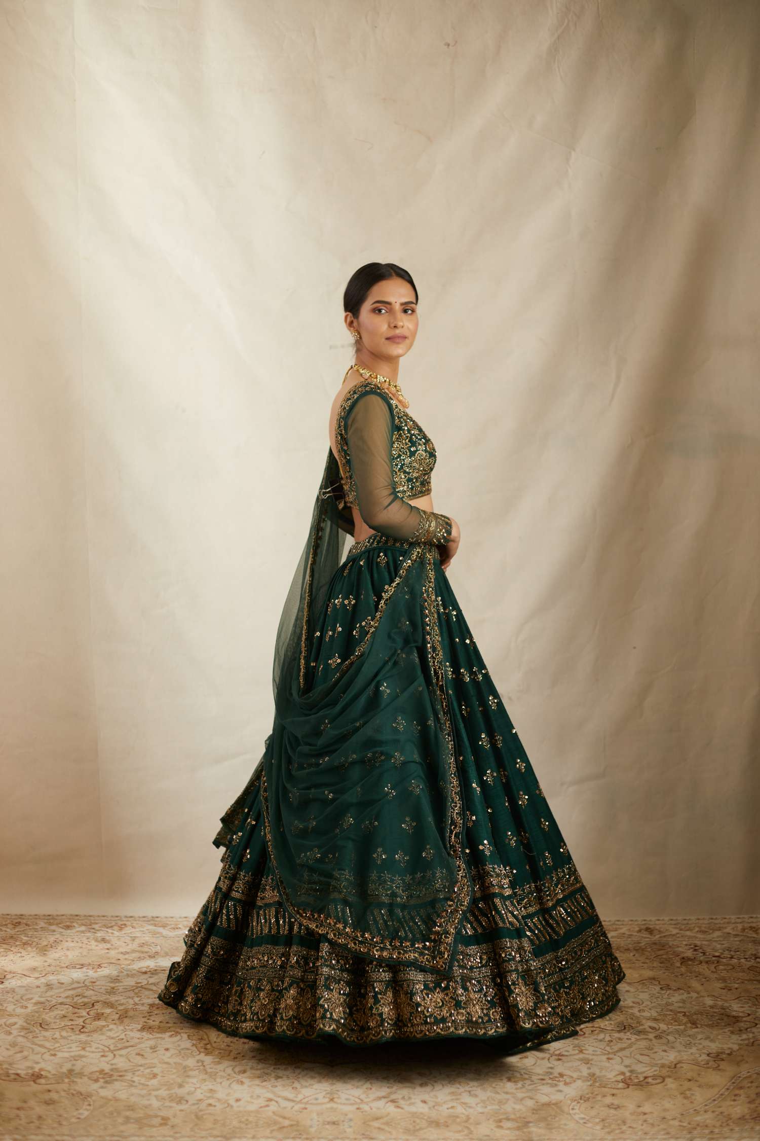 Side view of Embrelled Green Raw Silk Lehenga Set