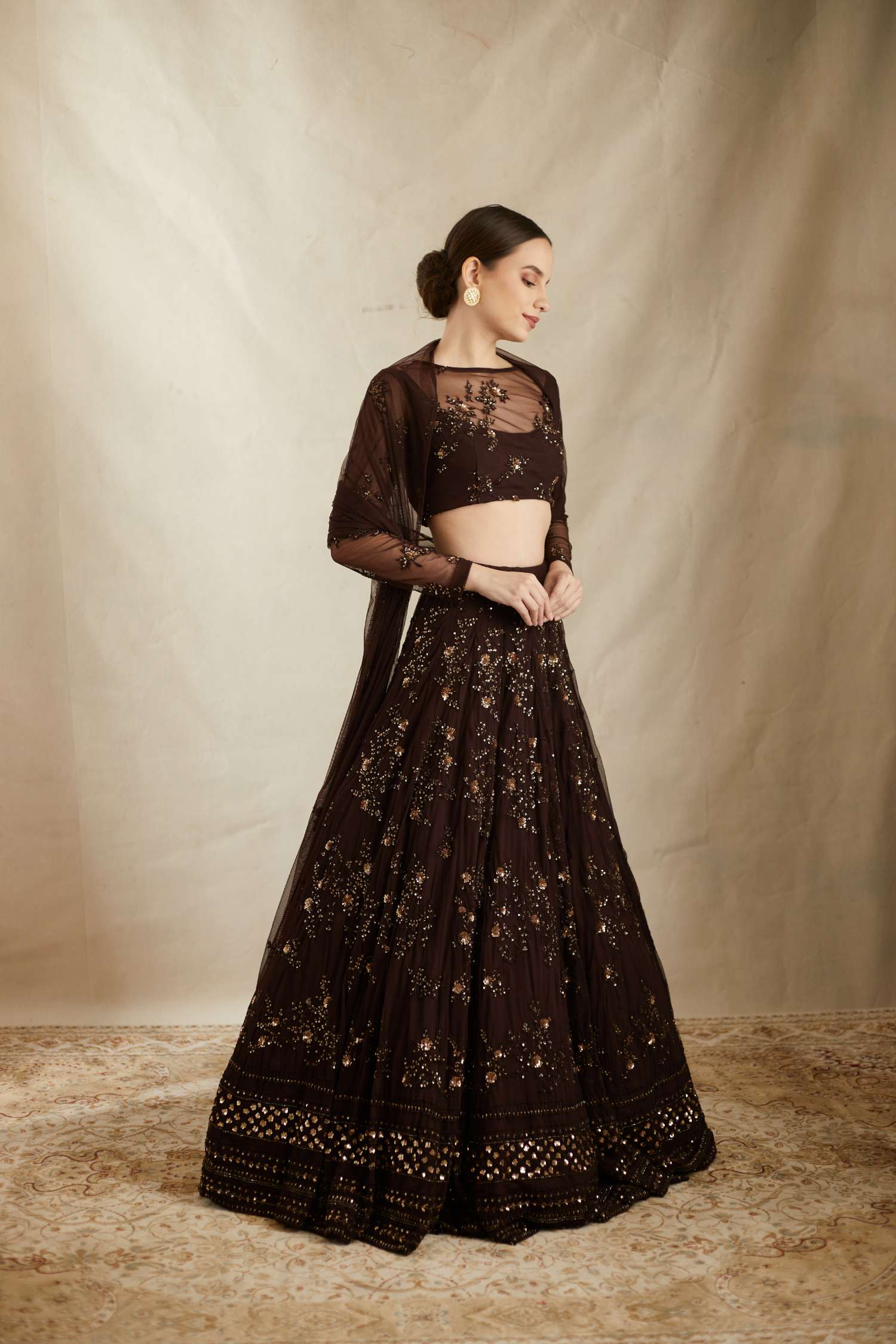 Front Side view of Dark Coffee Net Thread Embroidered Lehenga Set
