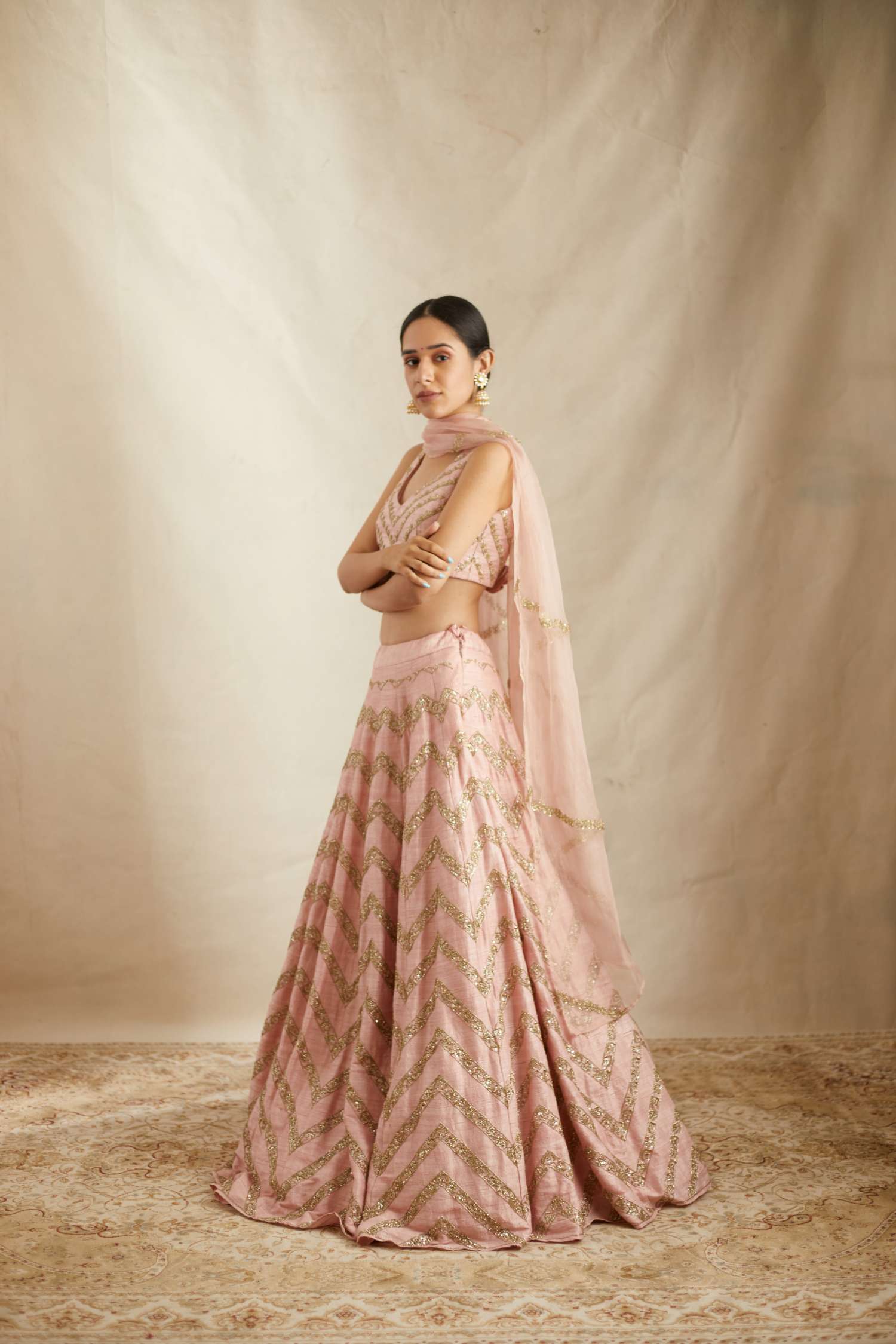 Close-up View of Blush Pink Raw Silk Zig Zag Work Lehenga Set