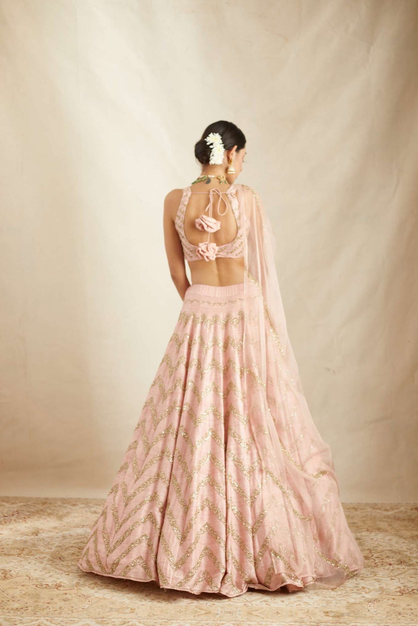 Back View of Blush Pink Raw Silk Zig Zag Work Lehenga Set