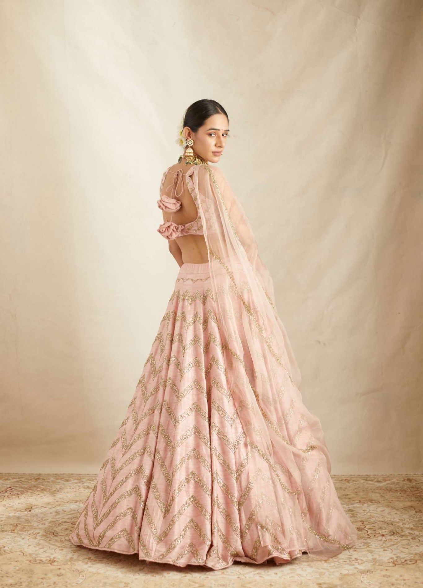 Back Front view of Blush Pink Raw Silk Zig Zag Work Lehenga Set