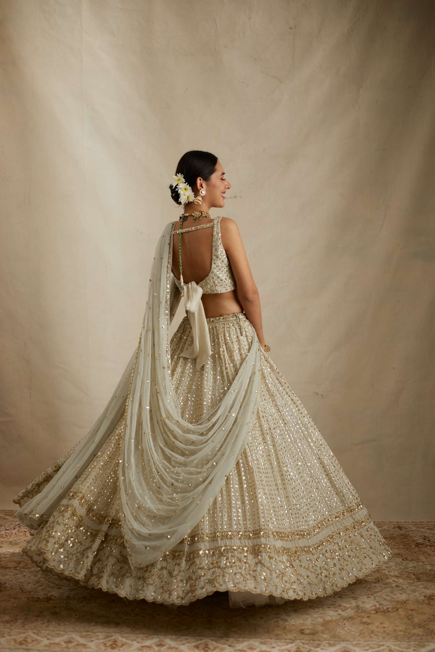 Back angle view of Mint Chanderi Heavy Sitara Work Lehenga Set