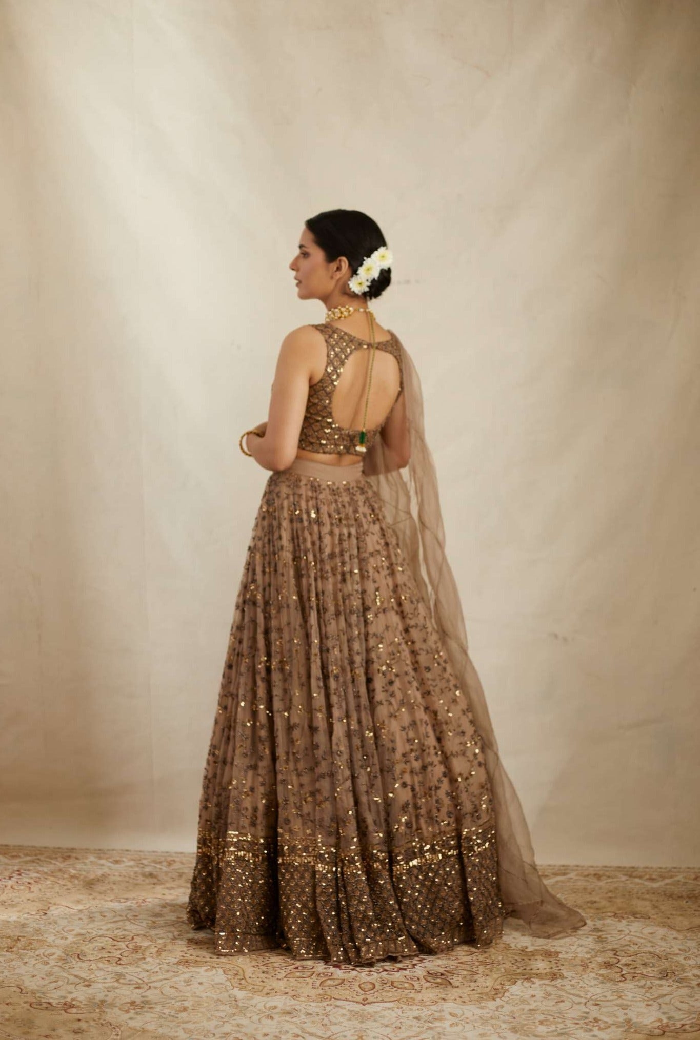 Side view of Brown Jaal Work Organza Lehenga Set