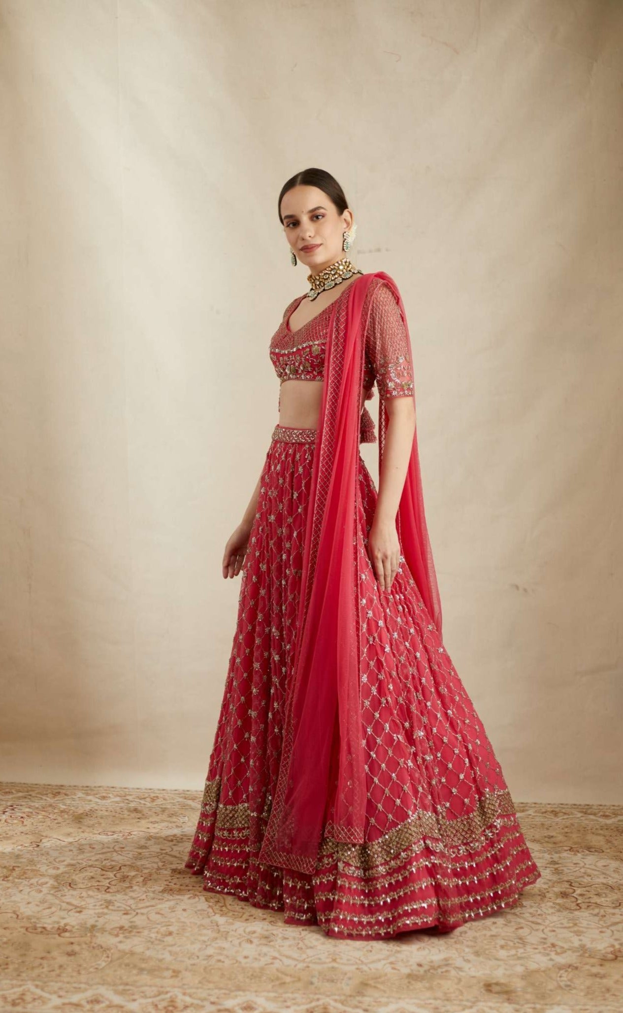 Front view of Caramine Pink Heavy Jaal Work Lehenga Set