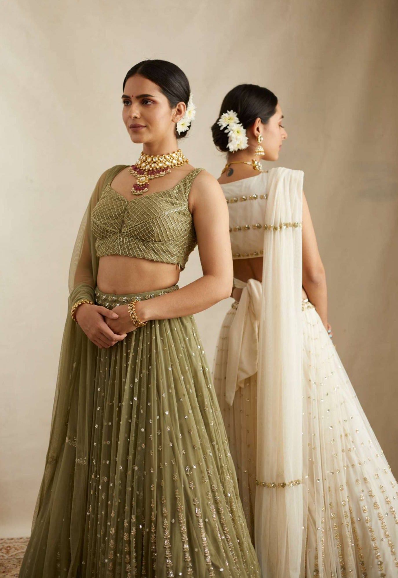 Side view of Olive Green Net Crepe Line Embroidered Lehenga