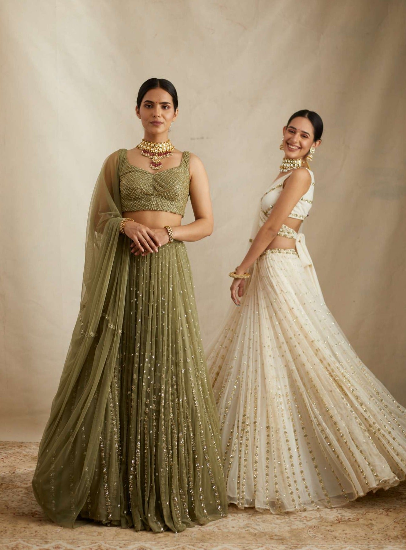 Front view of Olive Green Net Crepe Line Embroidered Lehenga