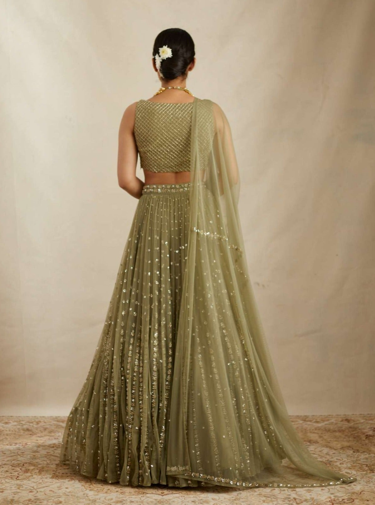 Back Angle view of Olive Green Net Crepe Line Embroidered Lehenga Set