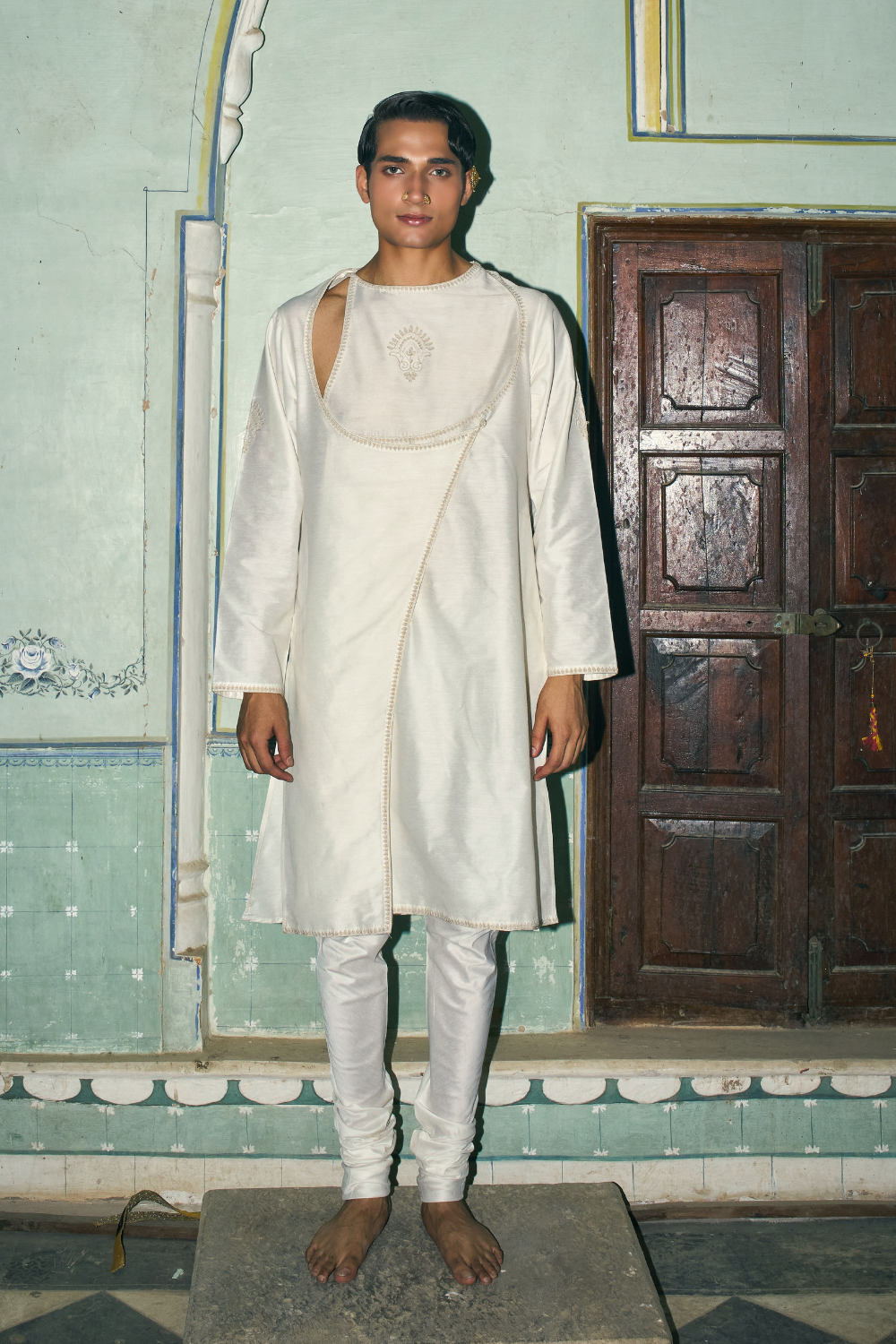Ivory cotton-silk angrakha paired with a churidar salwar
