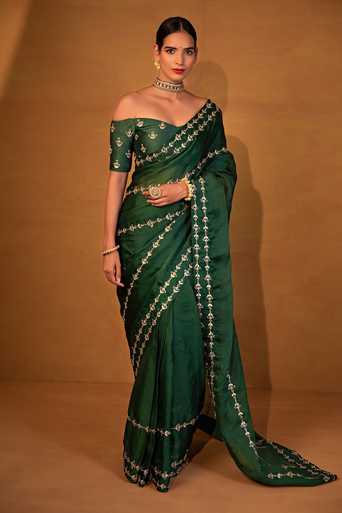 Dark green organza saree