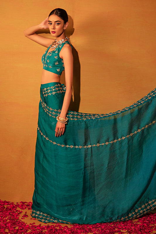Teal green organza saree