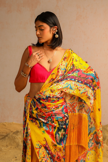 Yellow draped saree with hot pink blouse