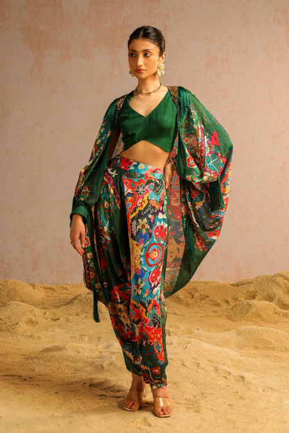 Green harem pants with blouse and cape