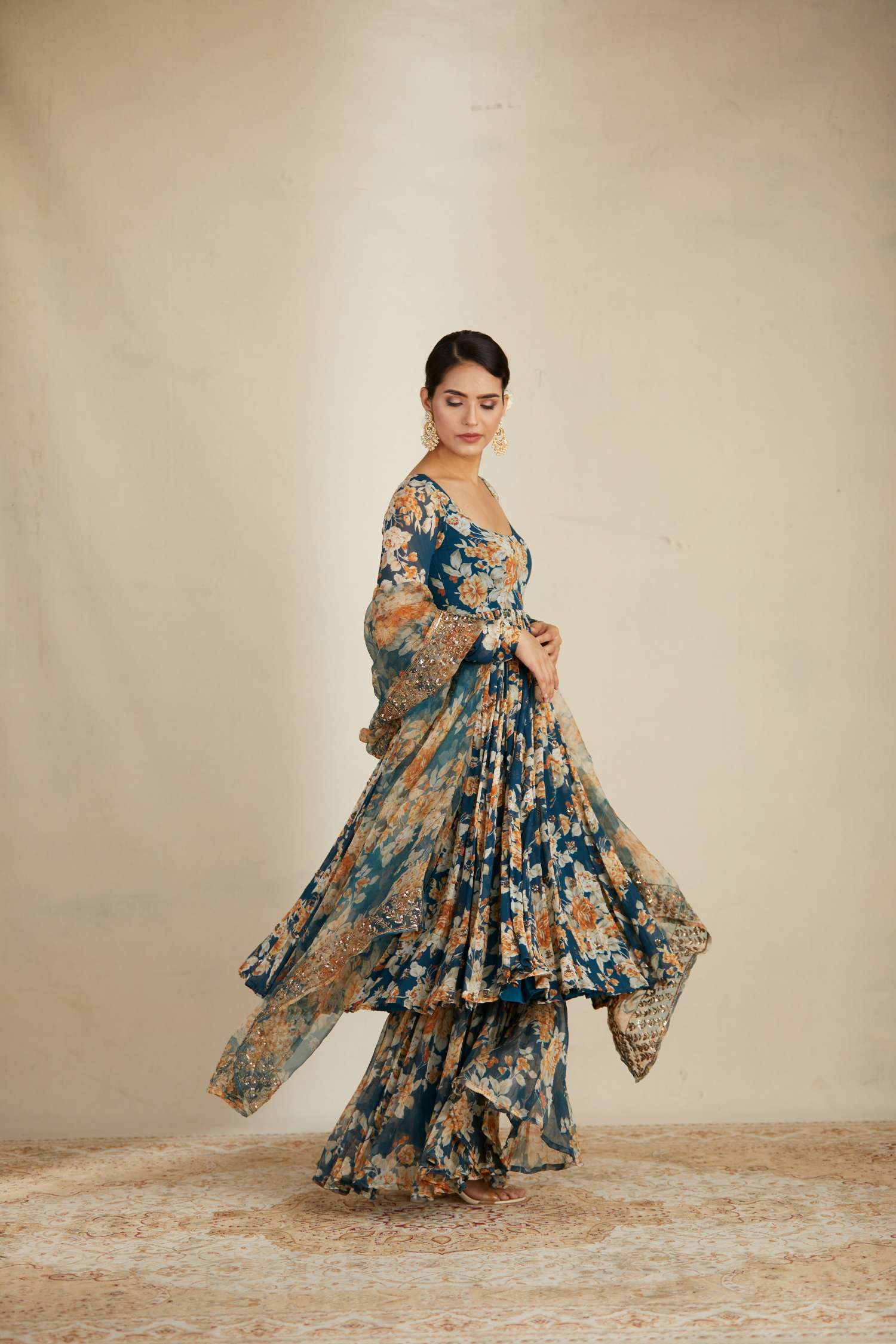 Side view of Teal Blue Georgette Floral Anarkali Set