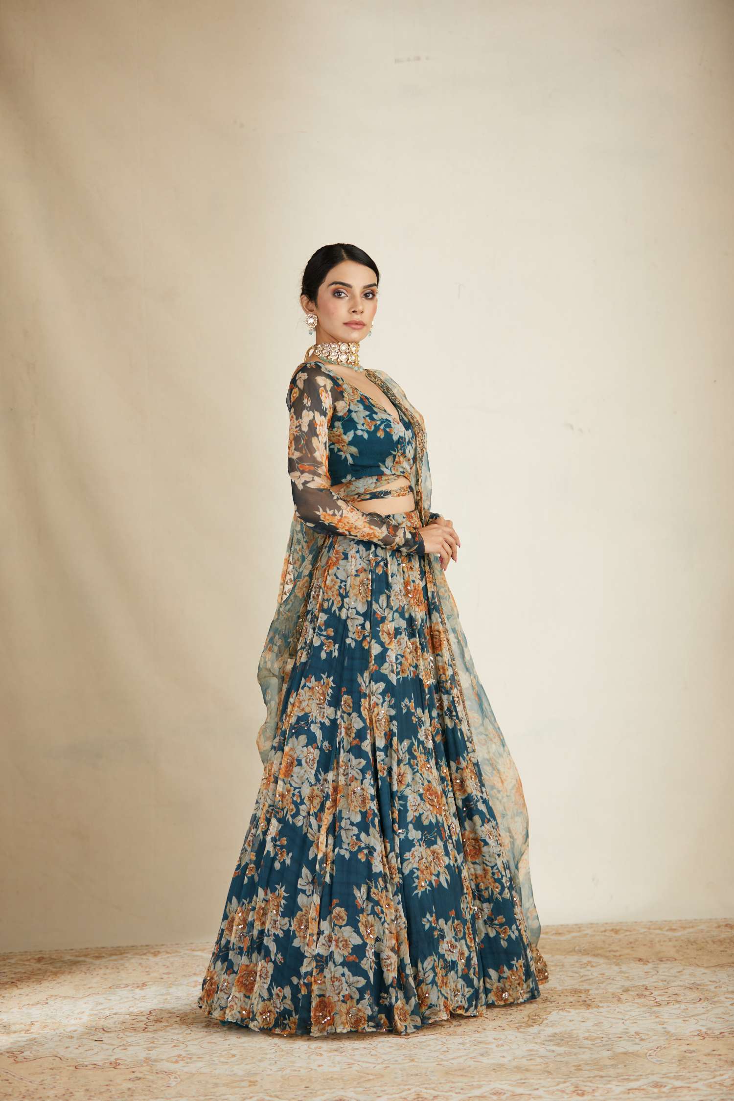 Side view of Teal Blue Chiffon Floral Lehenga Set for Women