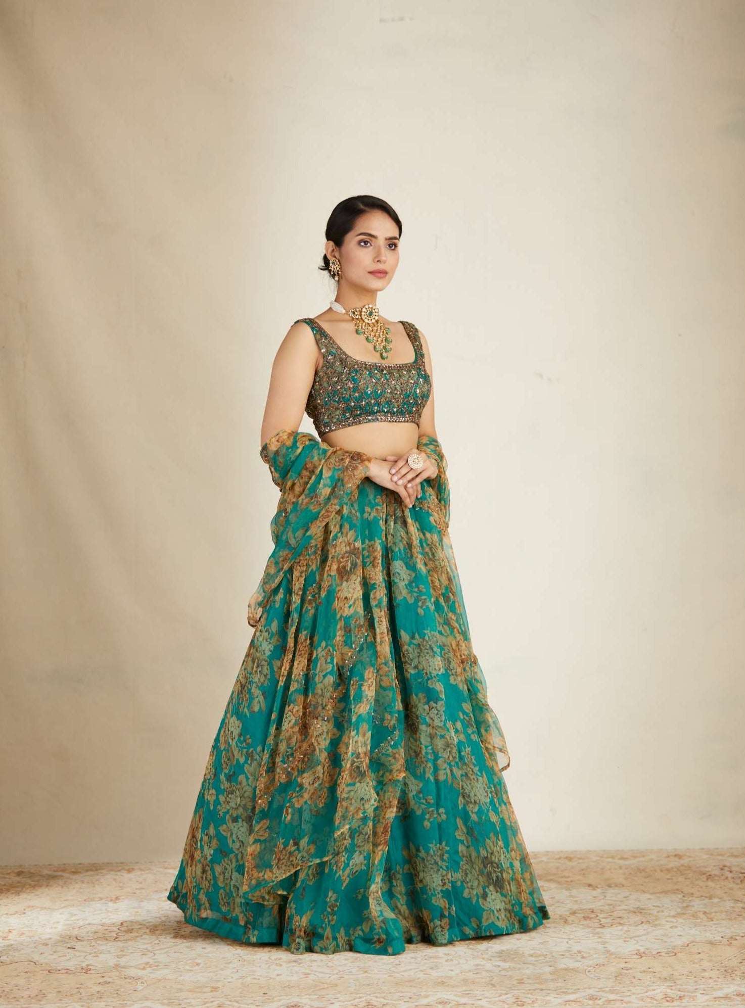 Front Side view of Teal Green Floral Organza Lehenga Set