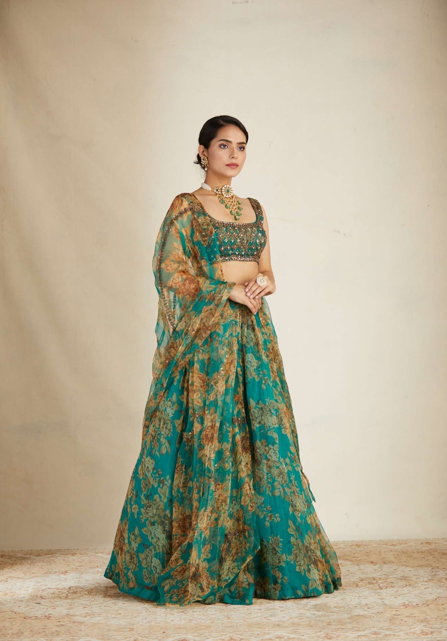 Front Side Look view of Teal Green Floral Organza Lehenga Set for Women