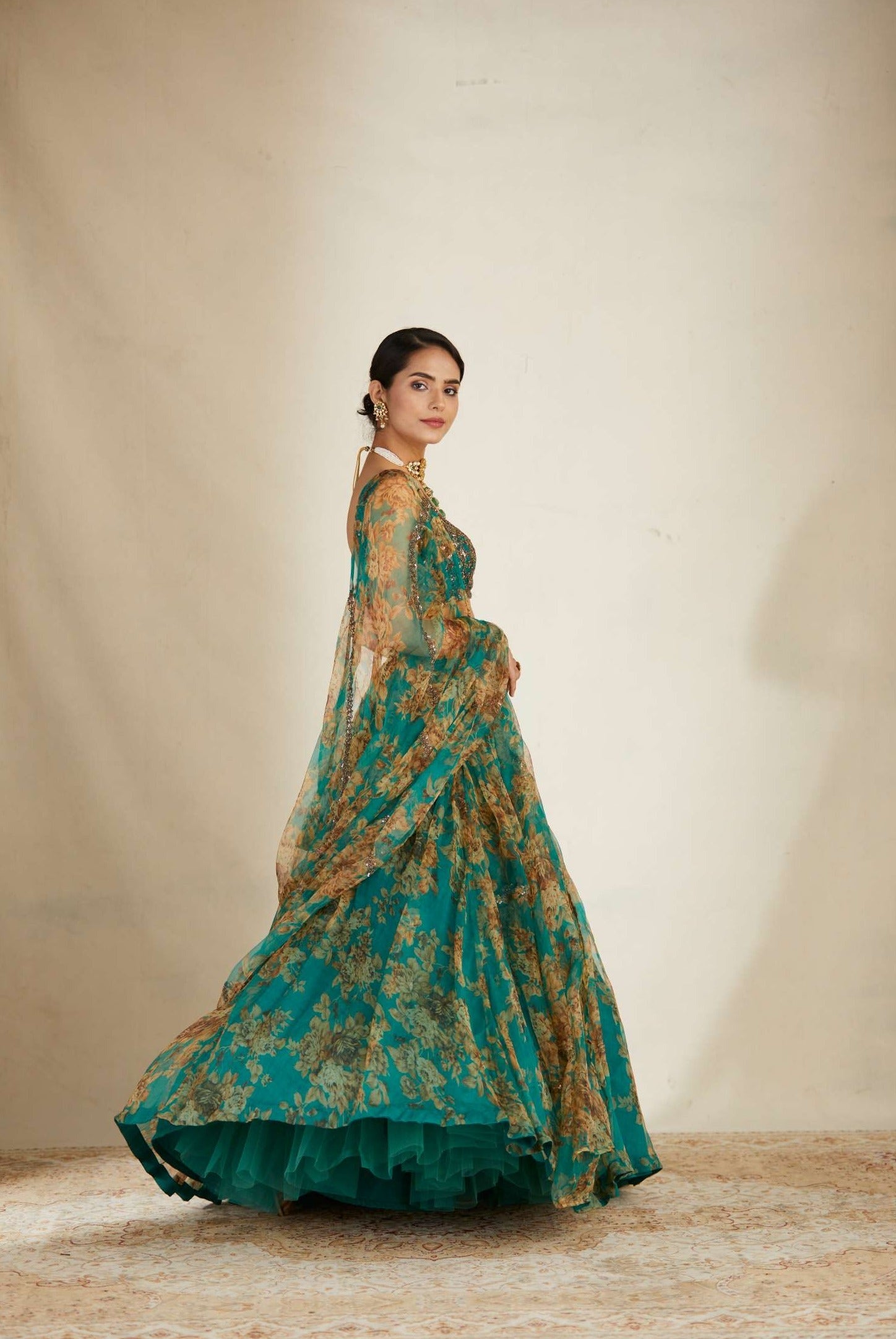 Side view of Teal Green Floral Organza Lehenga Set