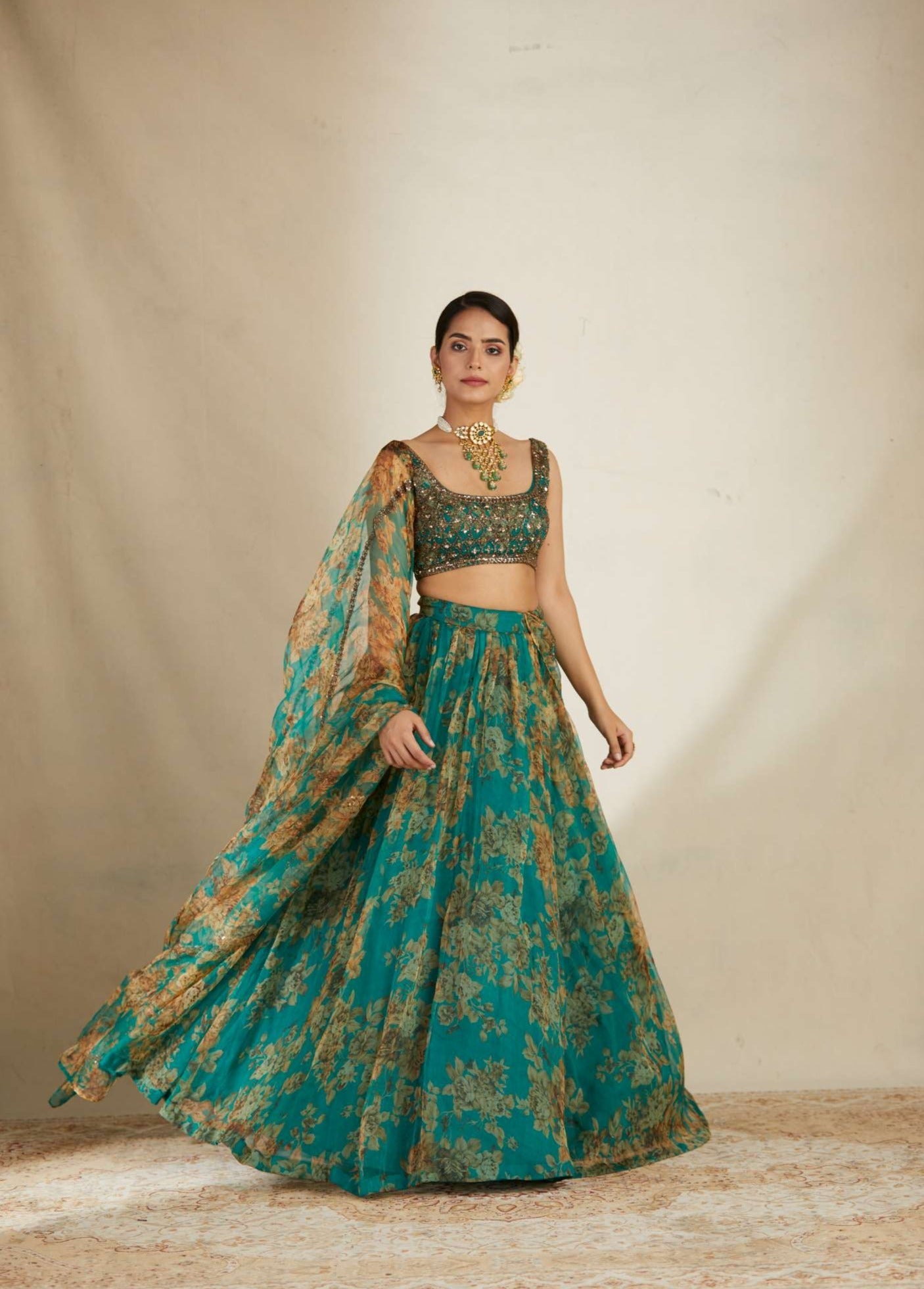 Front view of Teal Green Floral Organza Lehenga Set