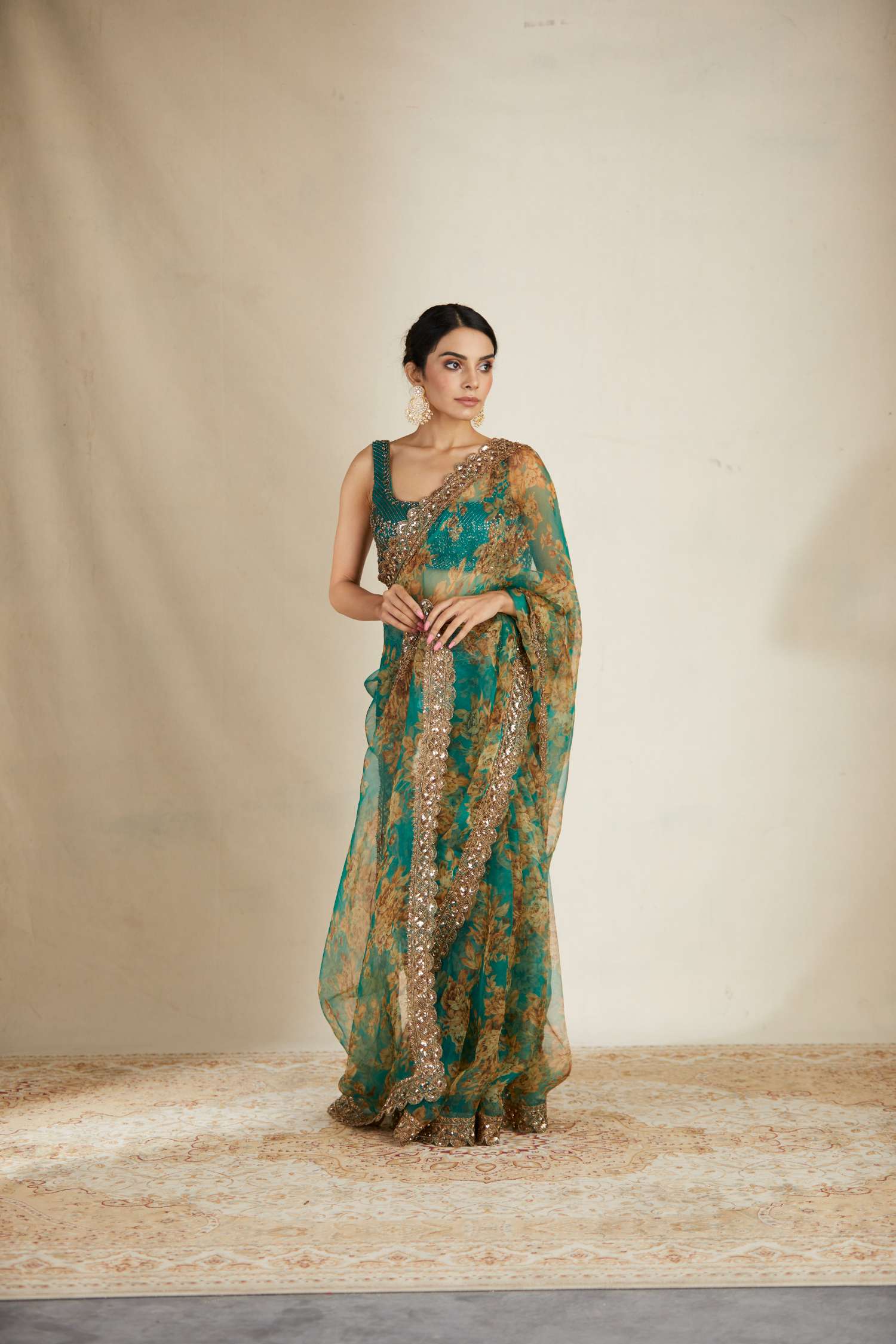Side Front view of Teal Green Floral Organza Saree Set