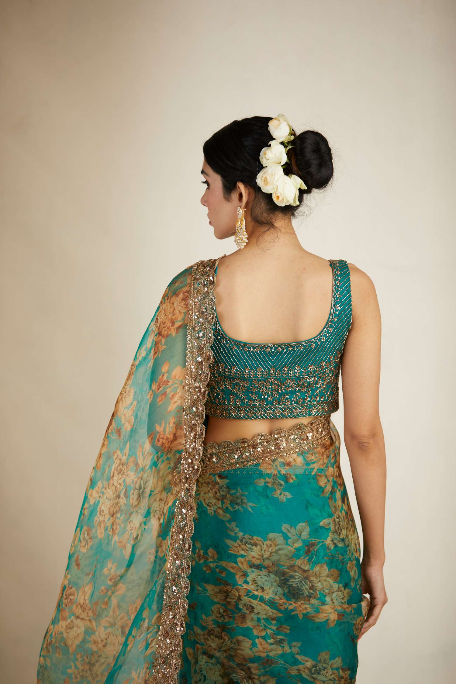 Close-up View Side Look of Teal Green Floral Organza Saree Set for Women