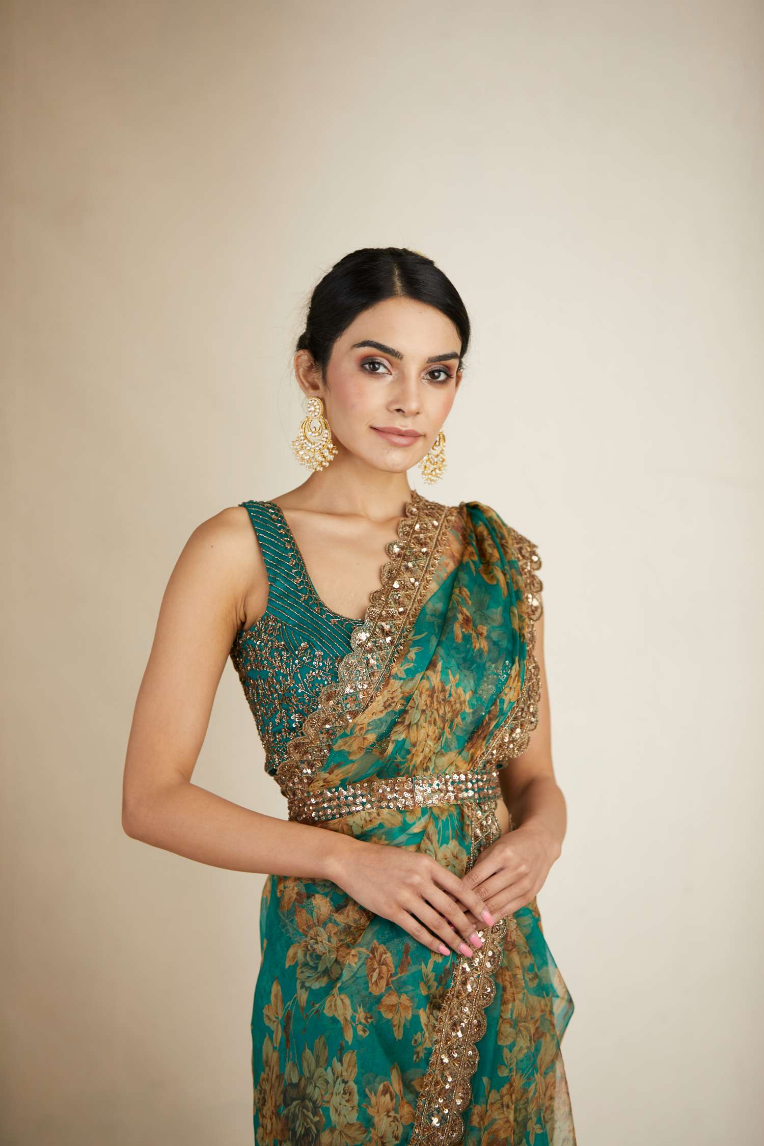 Front view of Teal Green Floral Organza Saree Set