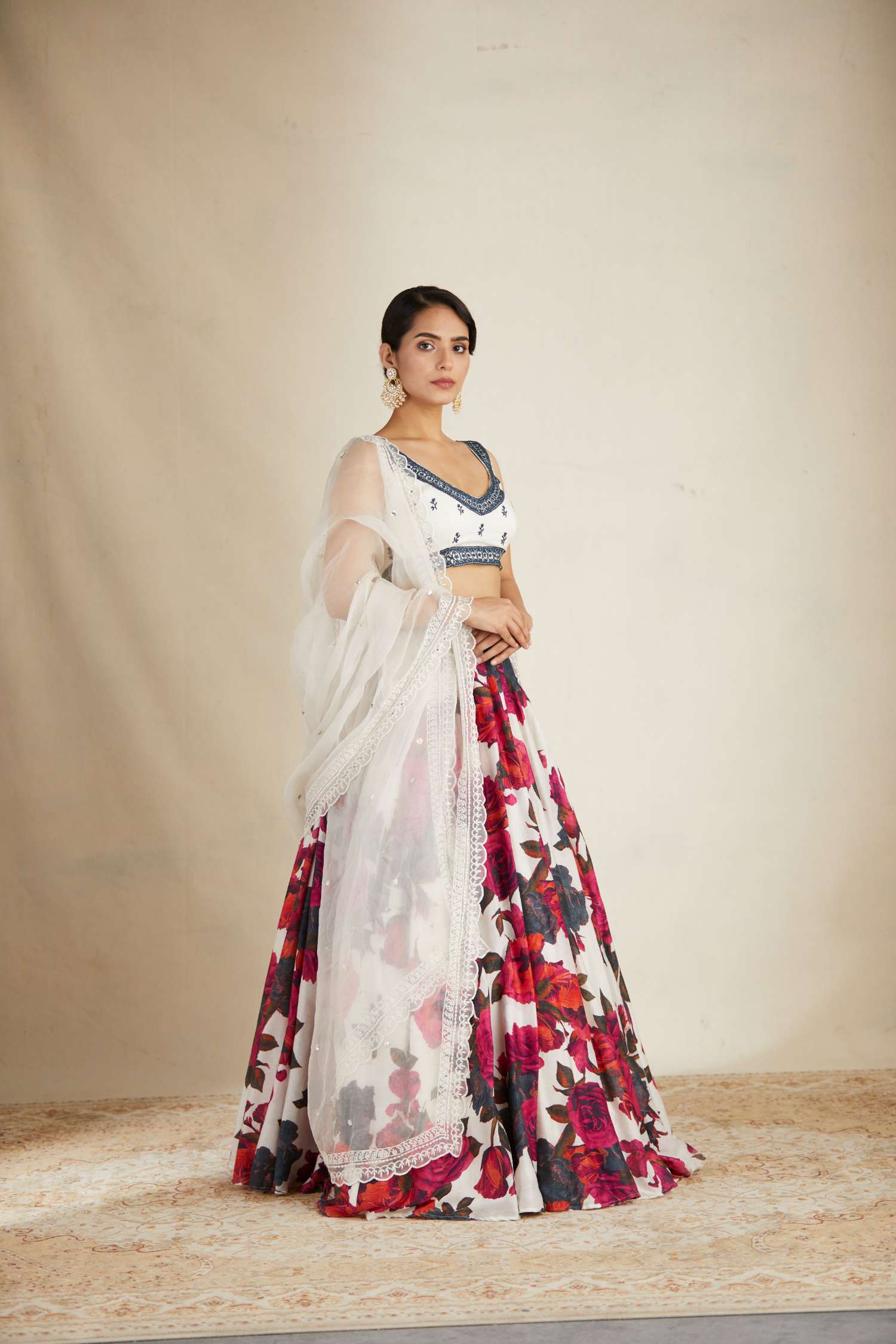 Side Front Look view of White Red Floral Chanderi Lehenga Set