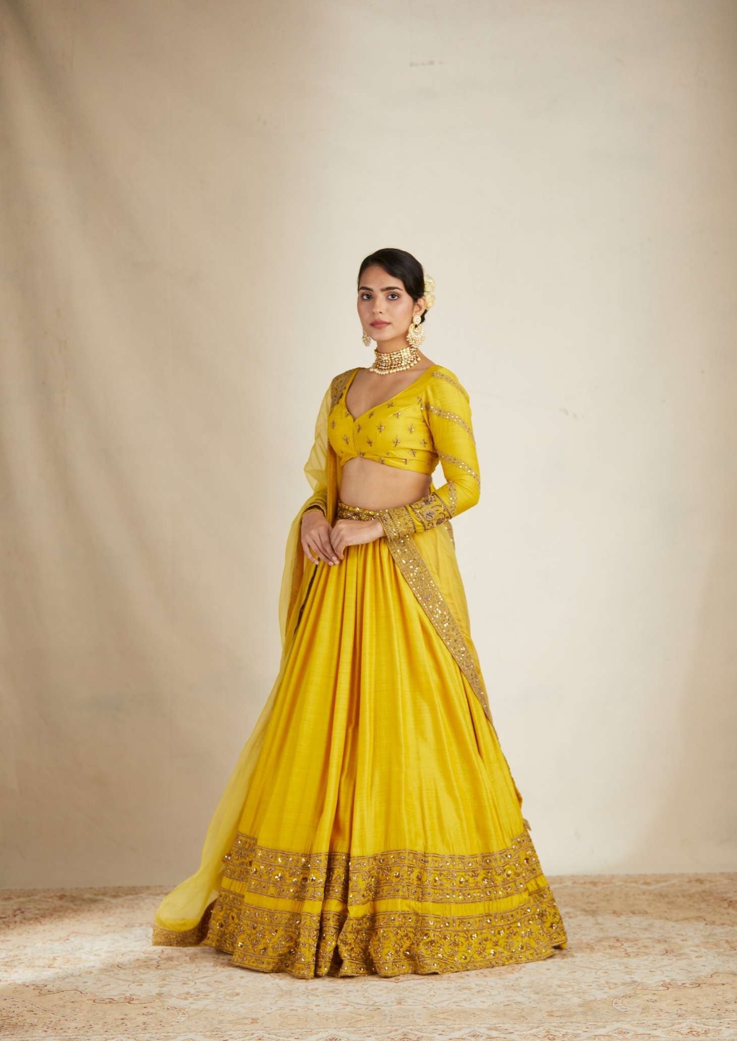 Front view of Mustard Chanderi Silk Crepe Bead Embroidered Lehenga Set