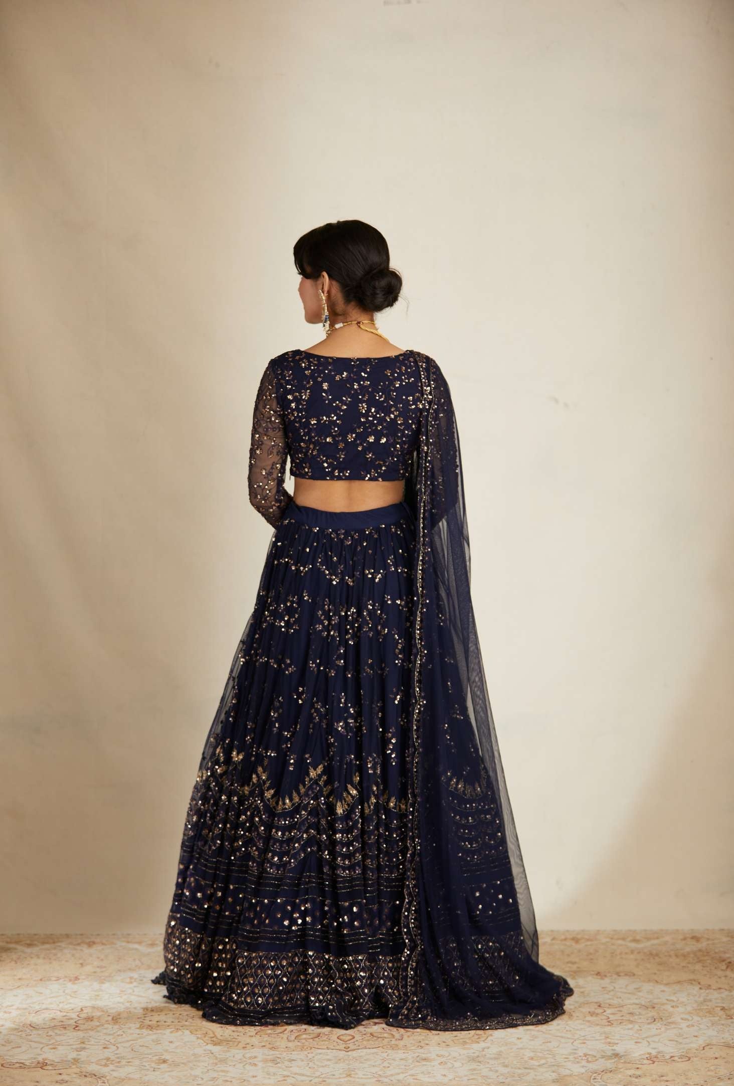 Back view of Navy Blue Heavy Double Border Lehenga Set