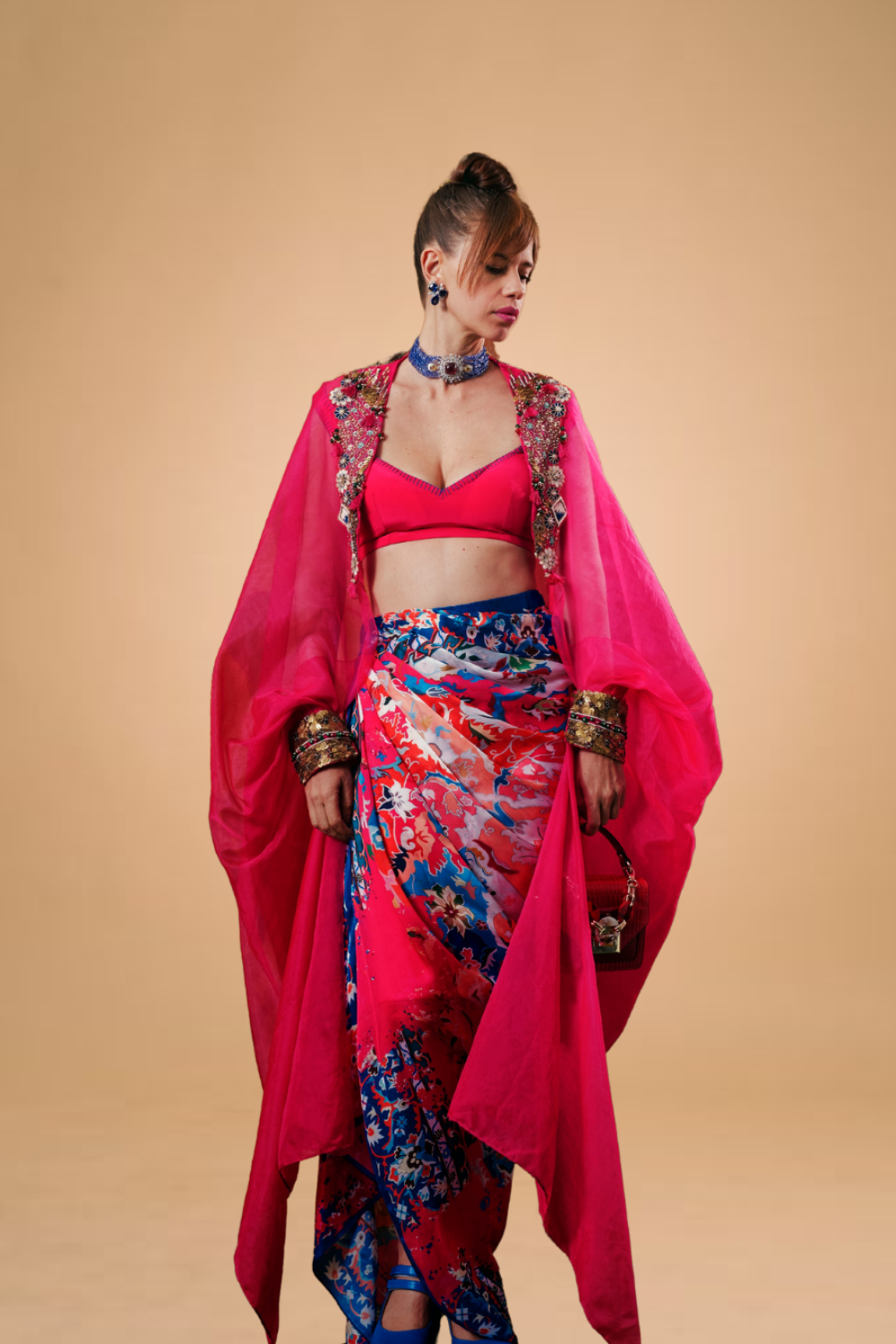 Kalki Koechlin in Hot pink draped skirt with blouse & cape