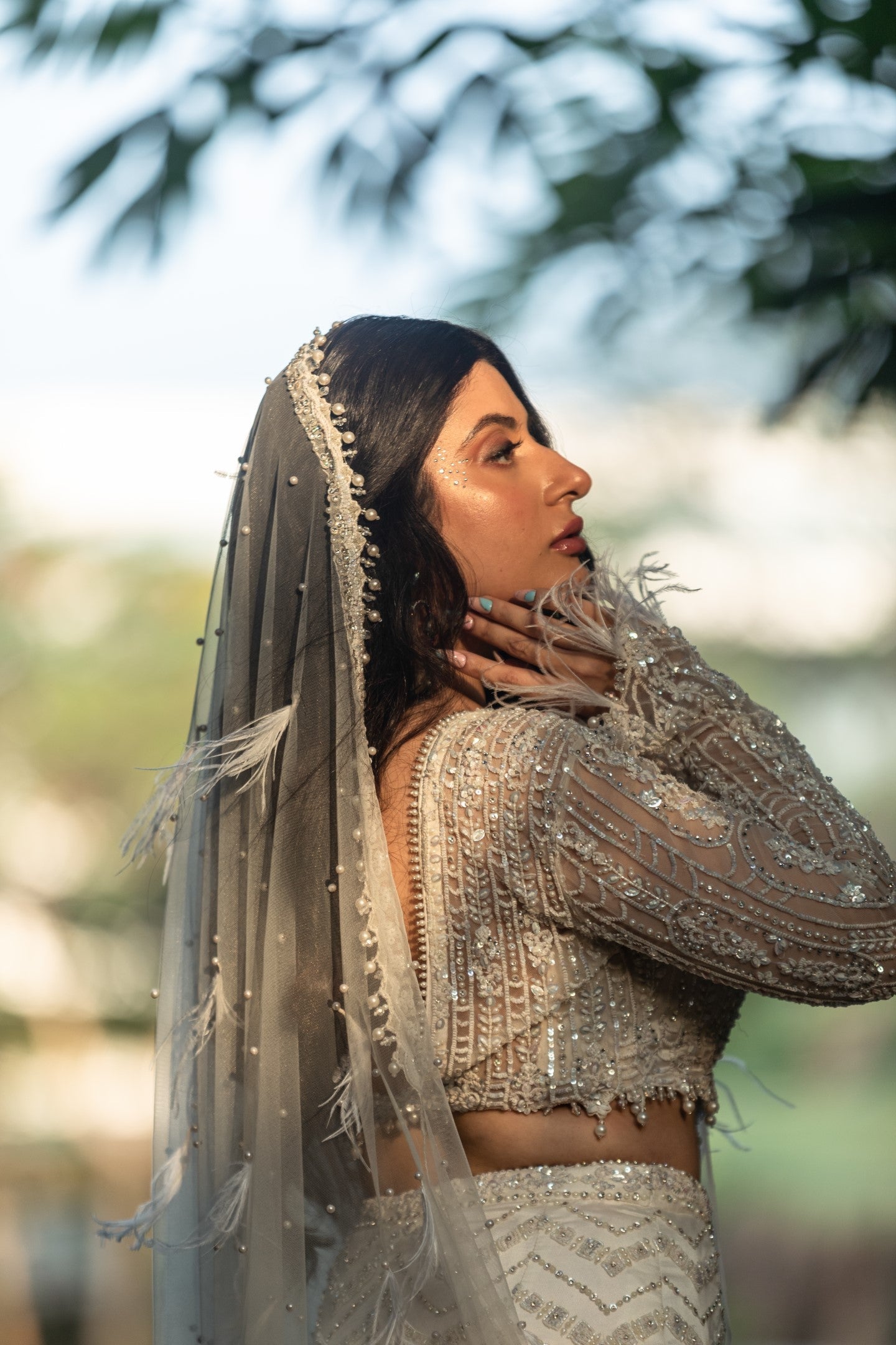Trishala In Ivory Skirt With Blouse And Veil