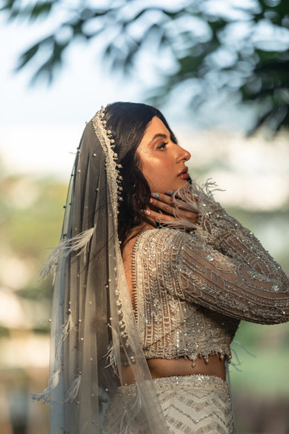 Trishala In Ivory Skirt With Blouse And Veil