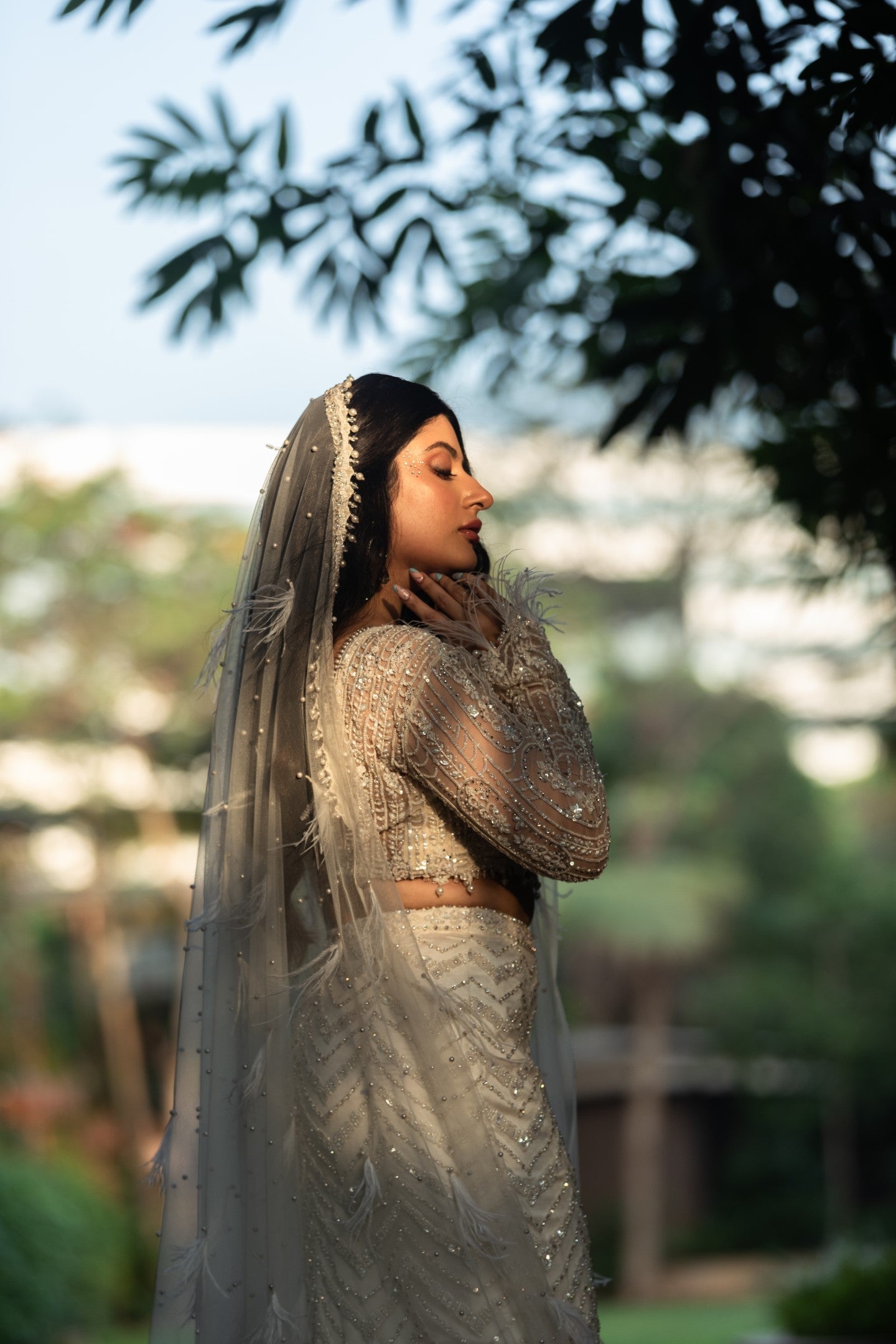 Trishala In Ivory Skirt With Blouse And Veil