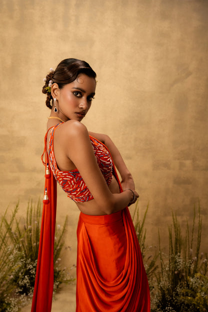 Bright Orange pre-draped modal satin saree with embroidered blouse