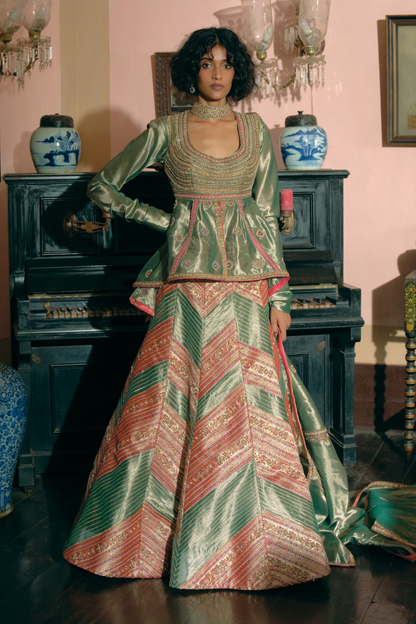 Kompal Matta Kapoor Emerald Green silk zari tissue peplum top with skirt and dupatta set