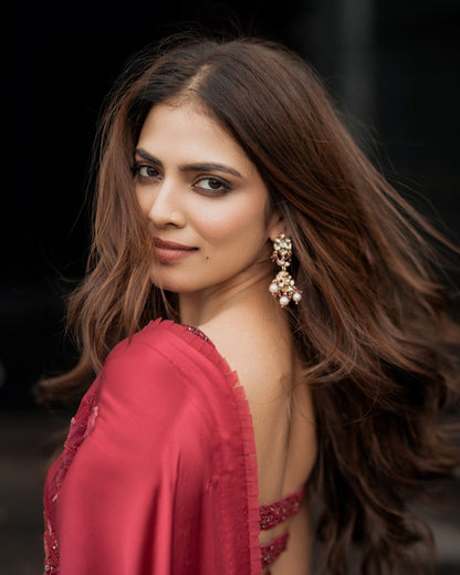 Malavika Mohanan In Strawberry Red Satin Saree