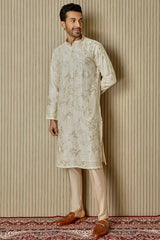 Ivory Opulence: Chanderi Silk Kurta with Sequin, Dabka, Moti, and Resham Embroidery - Asuka Couture