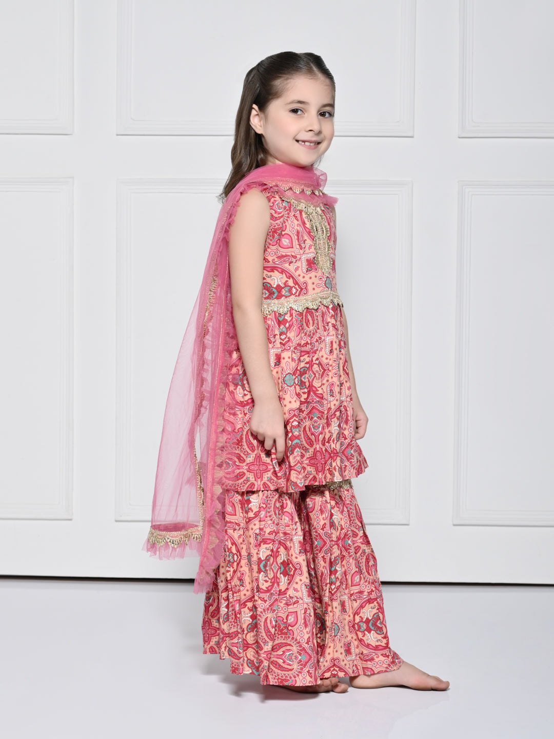 Peach and Pink Abstract - A Peach and Pink Sleeveless Rayon Suit for Girls